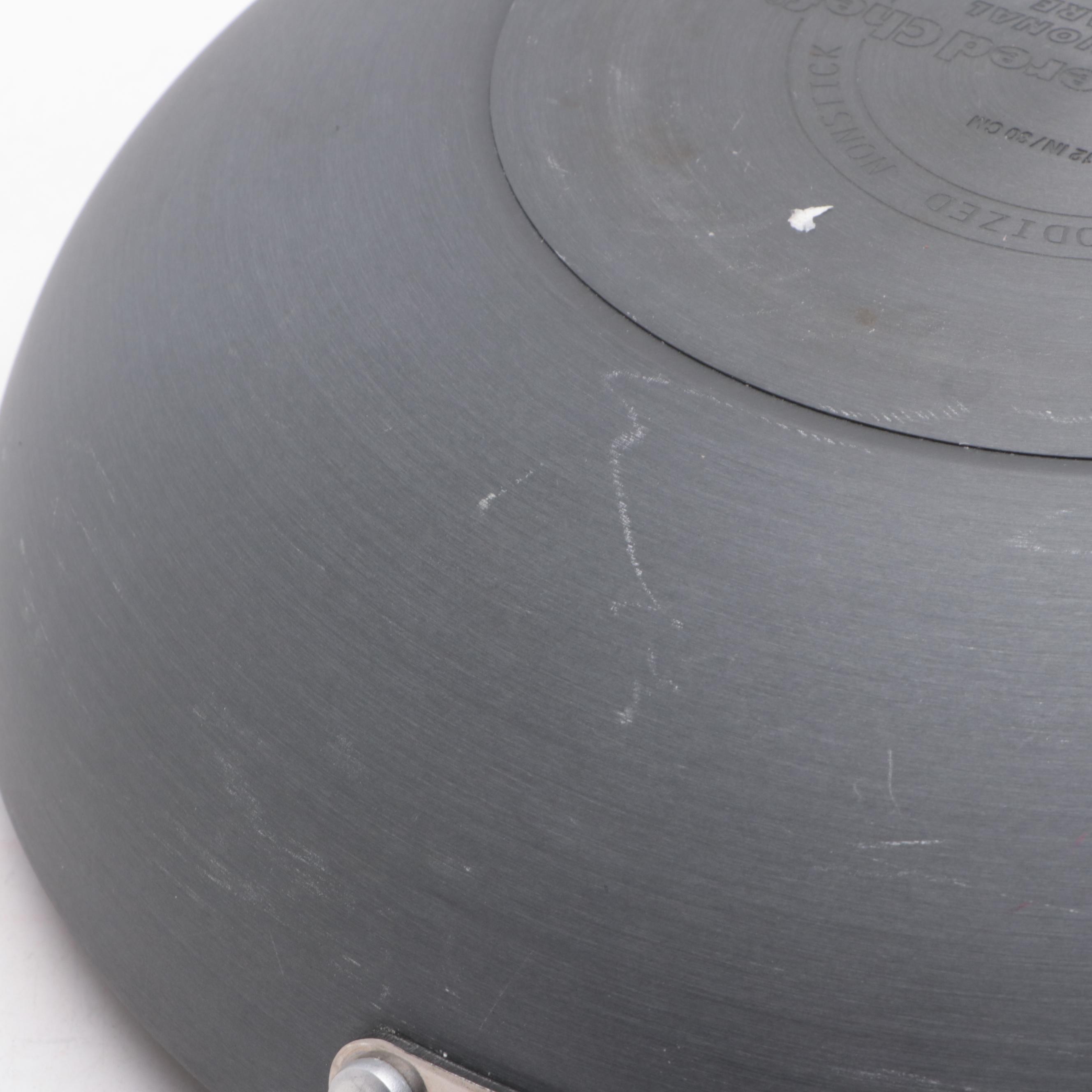 The Pampered Chef Nonstick Wok, Glass Lid, and Stainless Sauté Pans