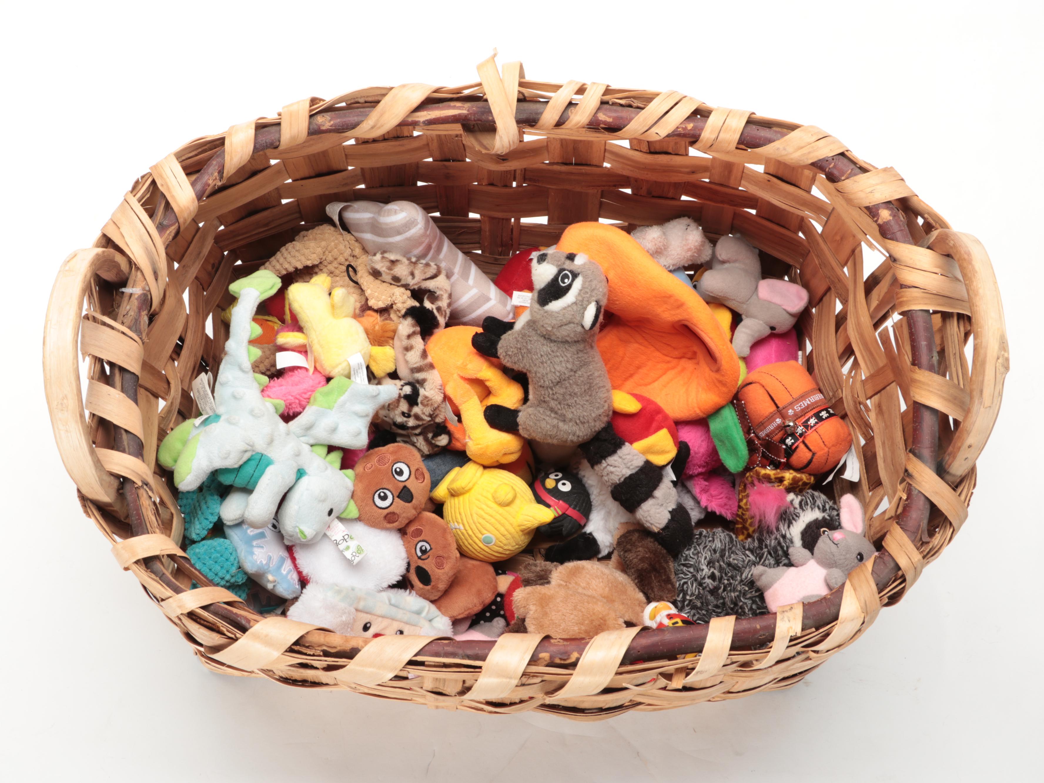 Baskets of Dog Toys, Stuffies, Padded Bed, Feeding Platform and More