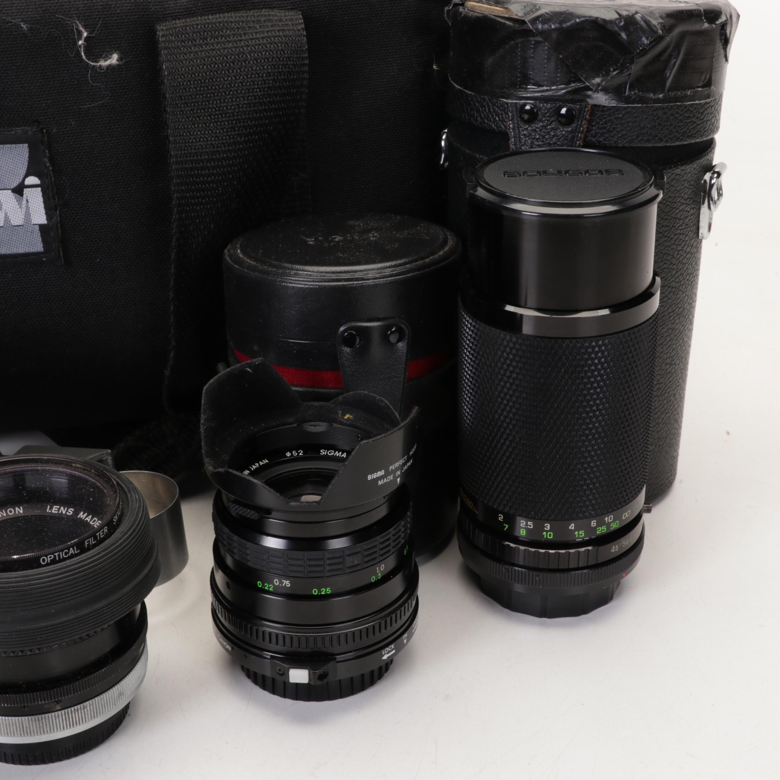 Canon A-1 Camera, Lenses, Kiwi Case, and More Accessories