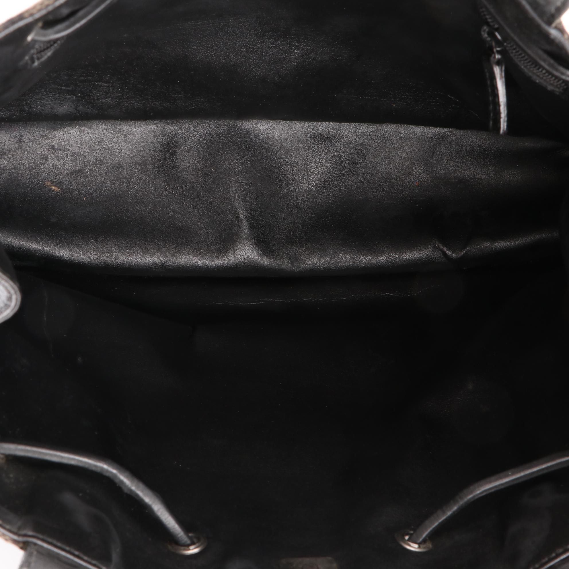 Gucci Drawstring Handbag in  Monogram Canvas and Leather