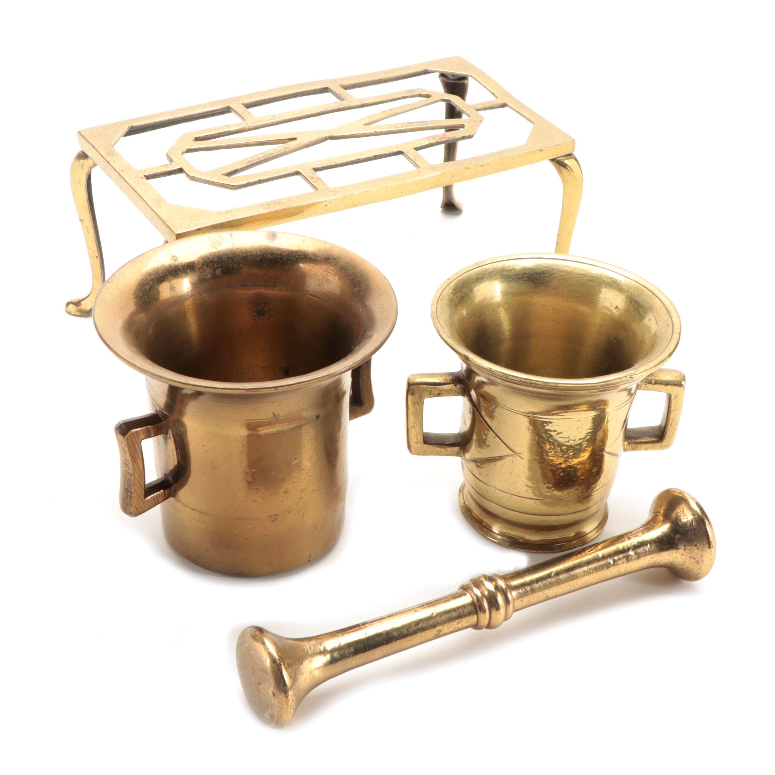 Brass Mortars and Pestle with Cast Brass Footed Trivet EBTH