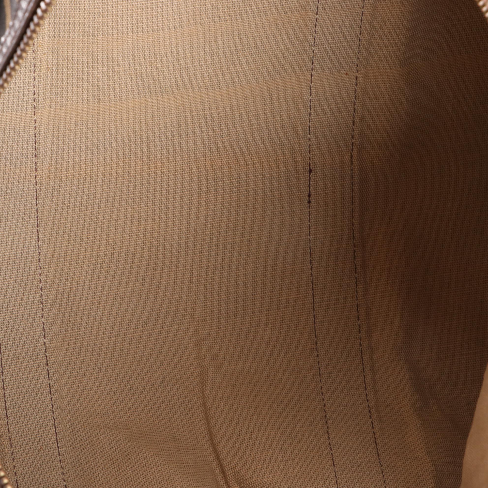 Fendi Small Duffle Bag in FF Zucca Jacquard Canvas and Brown Leather