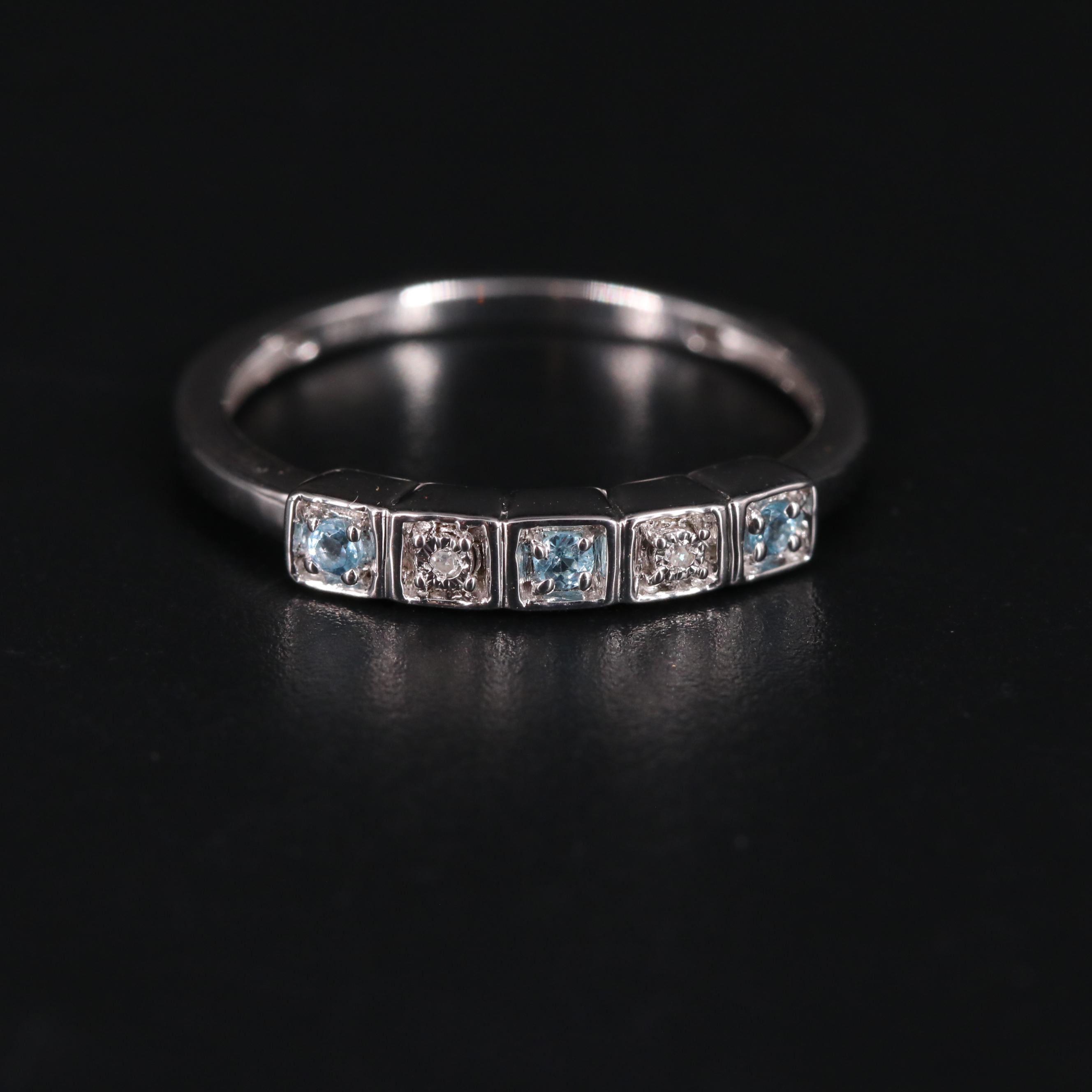 Sterling Silver Topaz and Diamond Ring