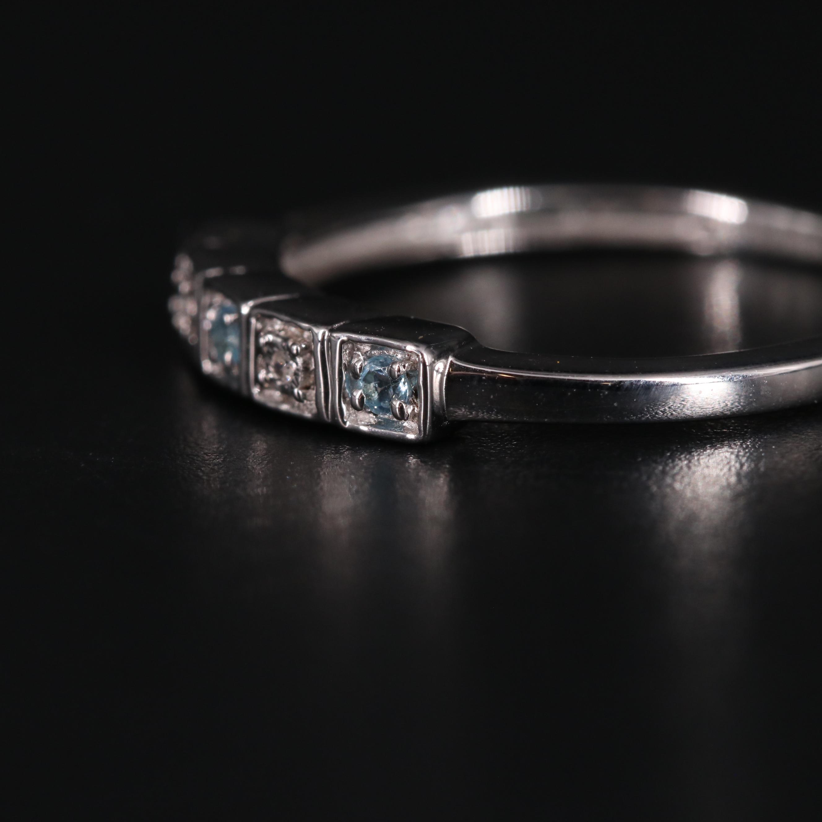 Sterling Silver Topaz and Diamond Ring