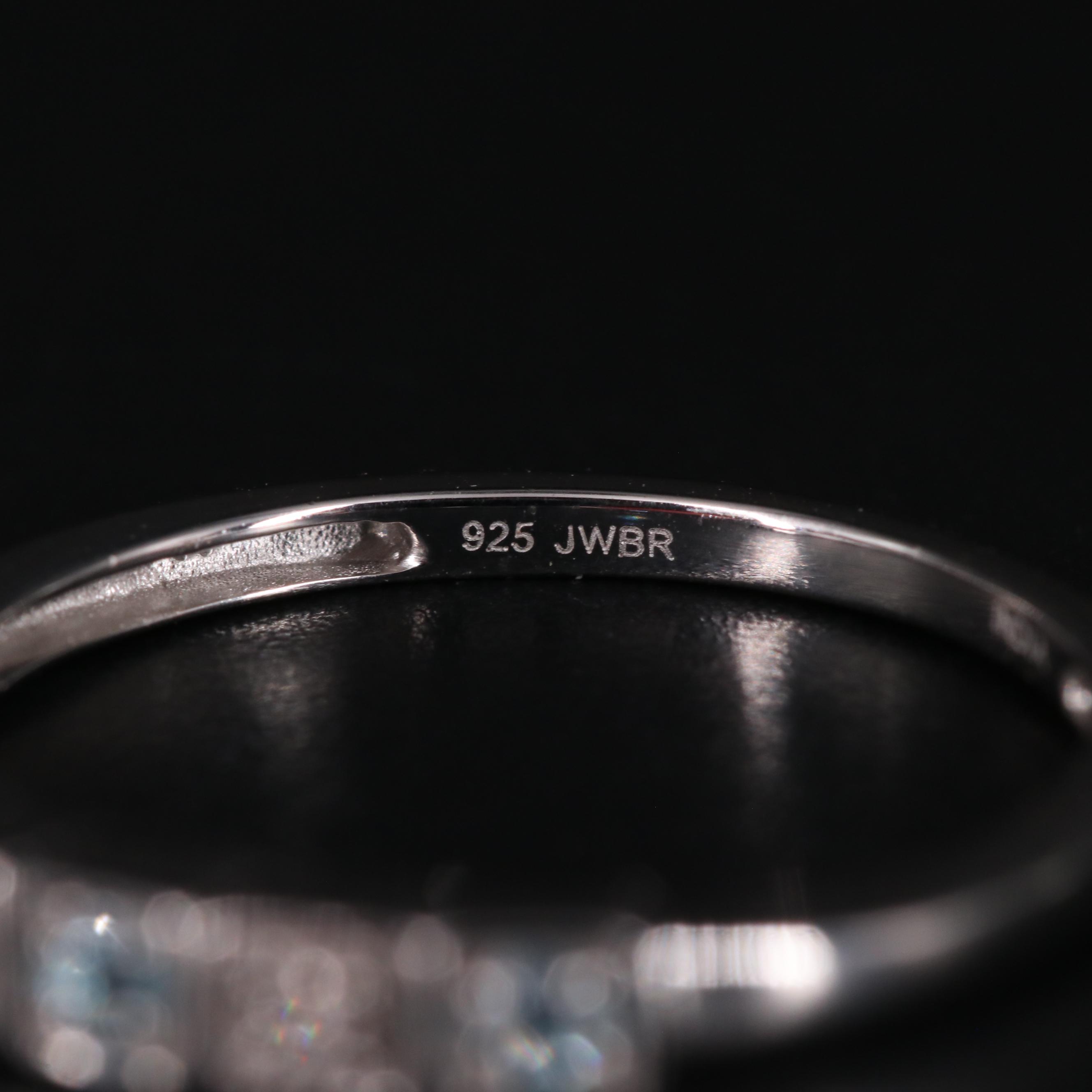 Sterling Silver Topaz and Diamond Ring