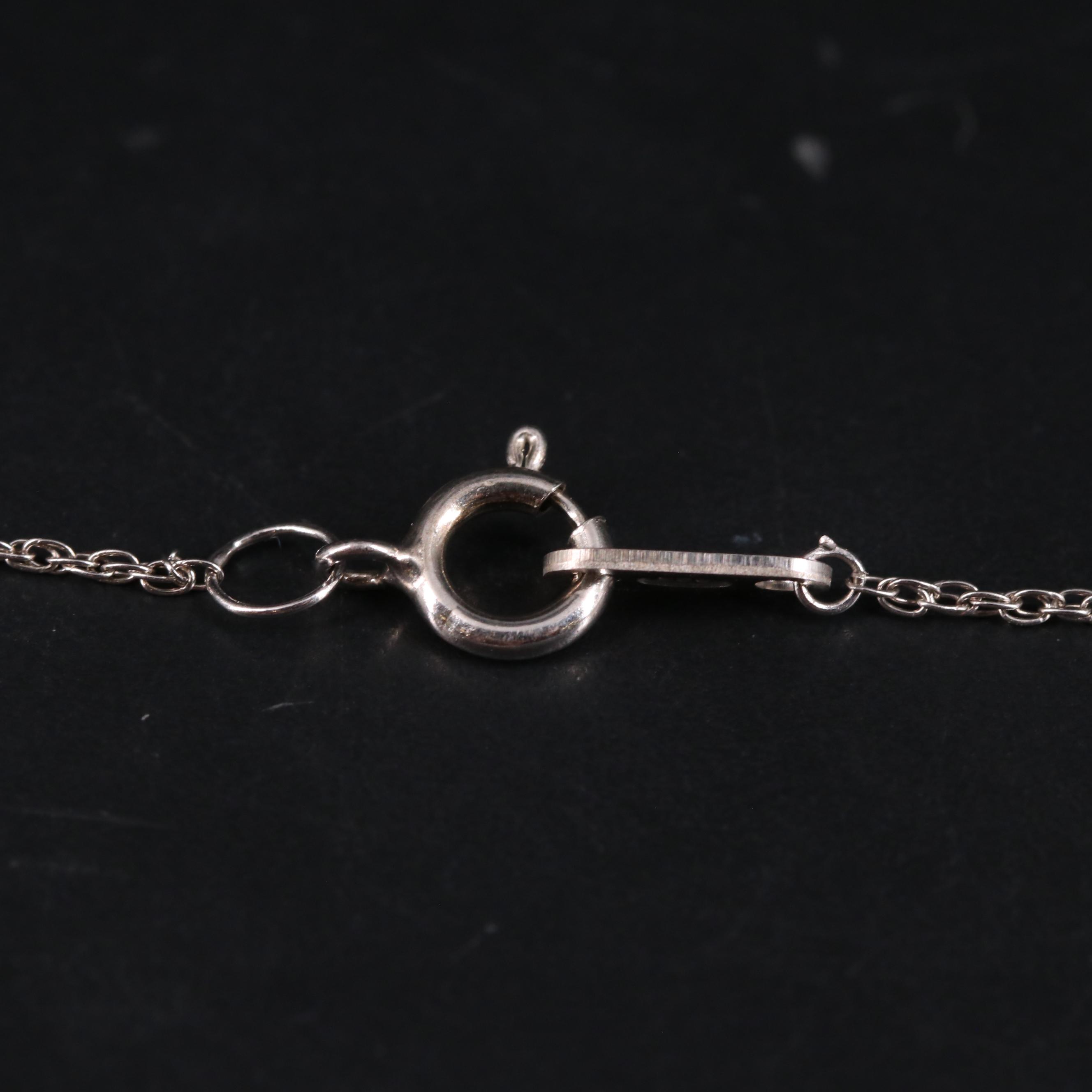 Sterling Silver Ruby and Diamond Pendant Necklace