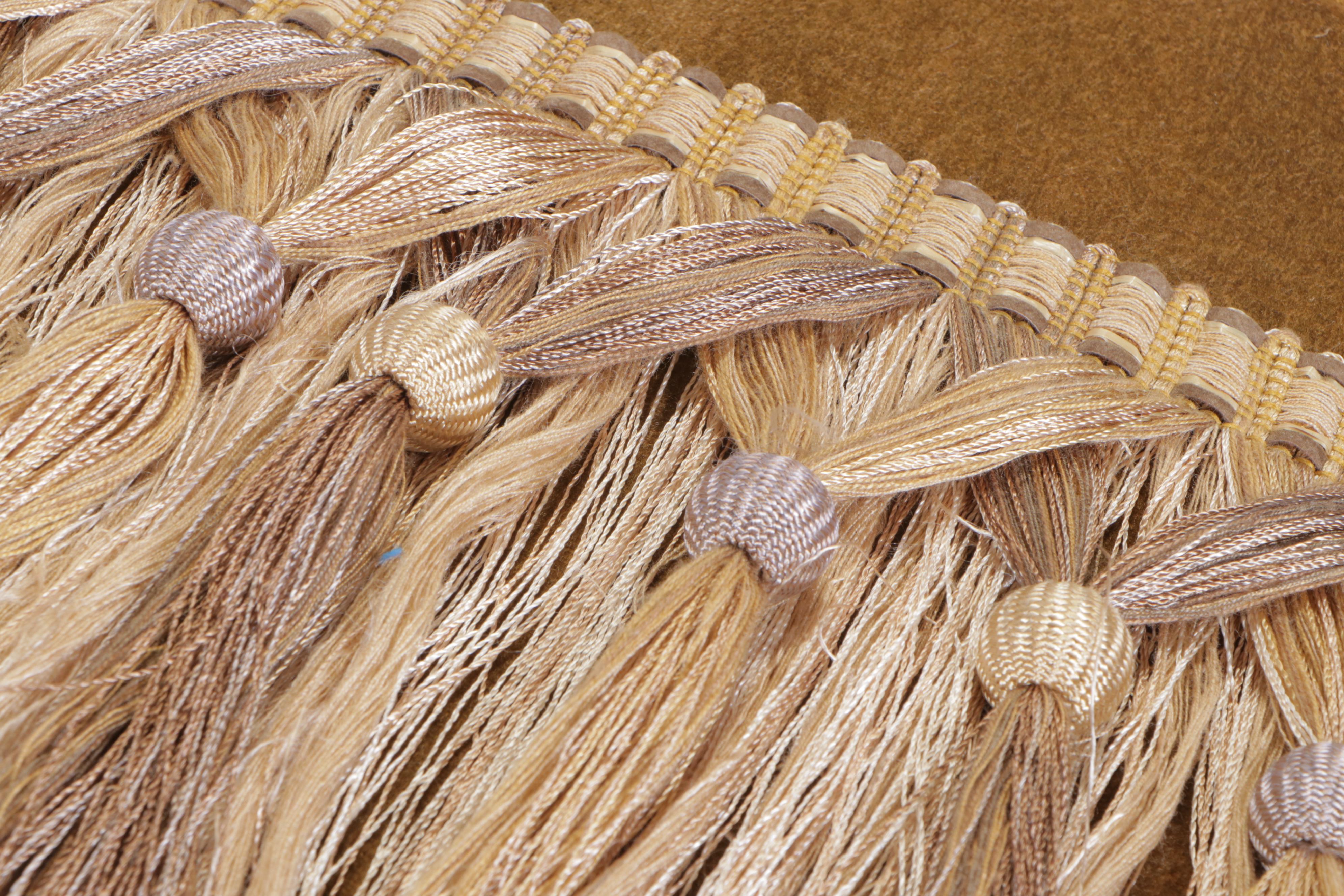 Custom-Upholstered and Button-Tufted Rolling Ottoman