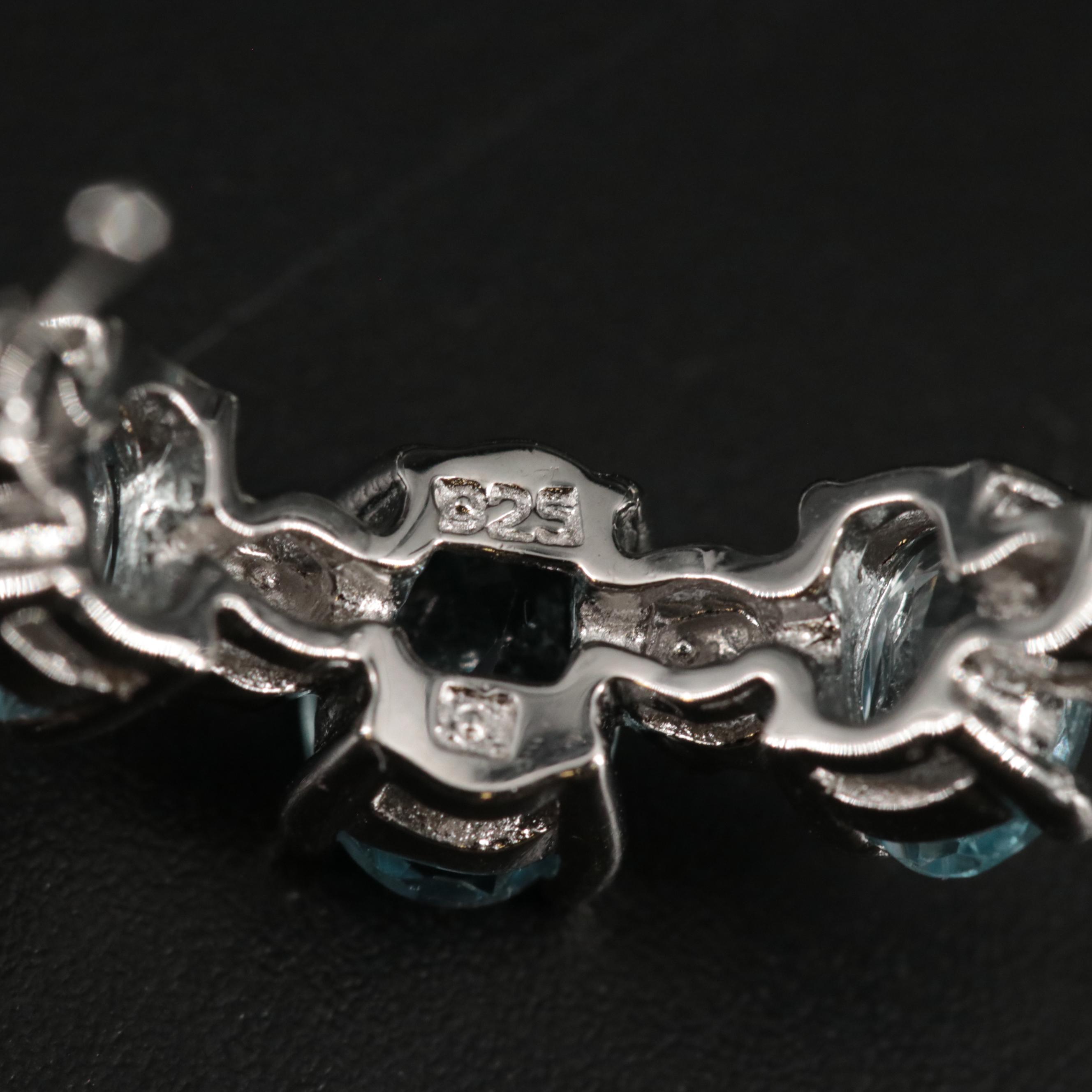 Sterling Silver Topaz and Cubic Zirconia Earrings