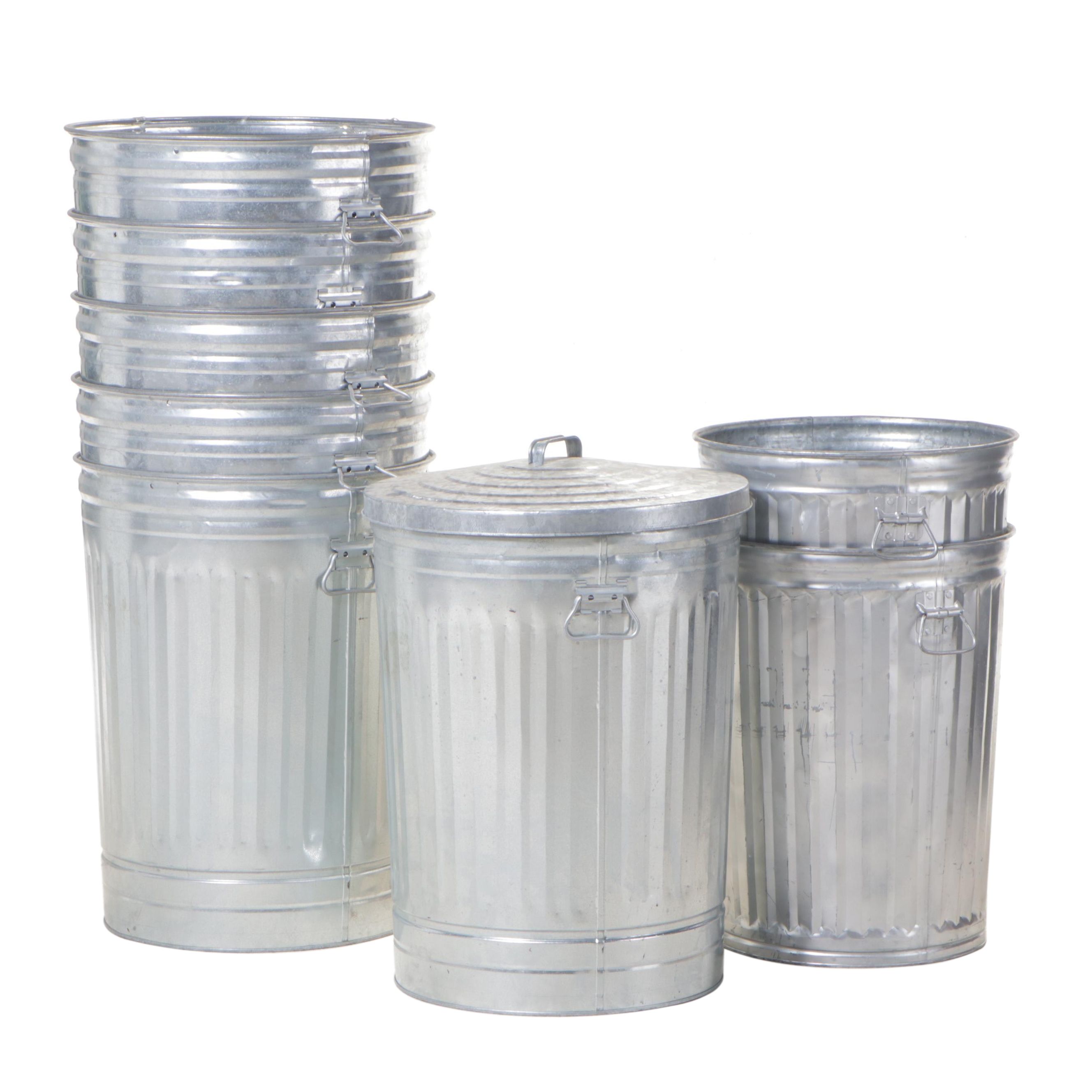 Eight Galvanized Garbage Cans with One Lid