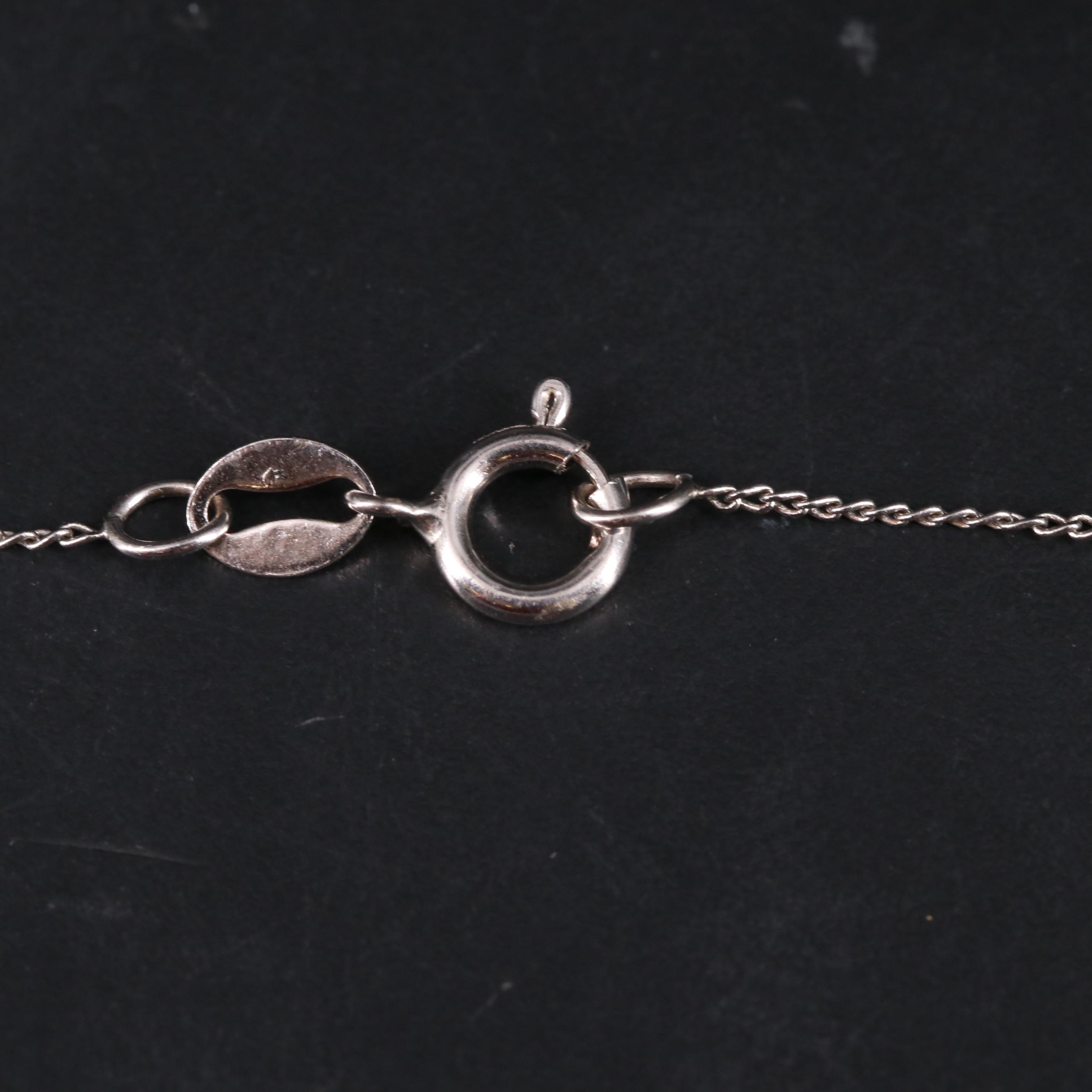 Sterling Silver Ruby and Diamond Necklace