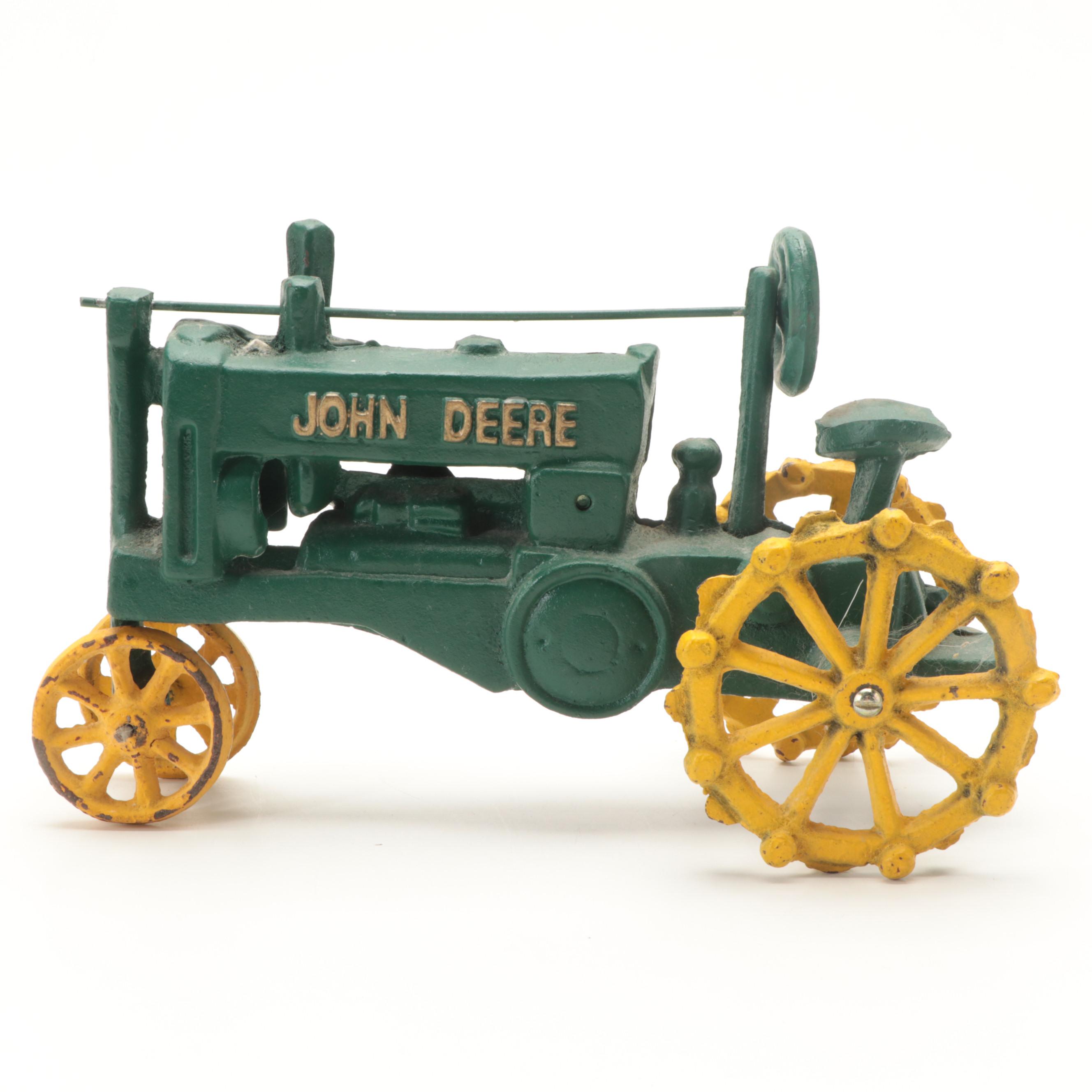Painted Cast Iron John Deere Tractor Toy