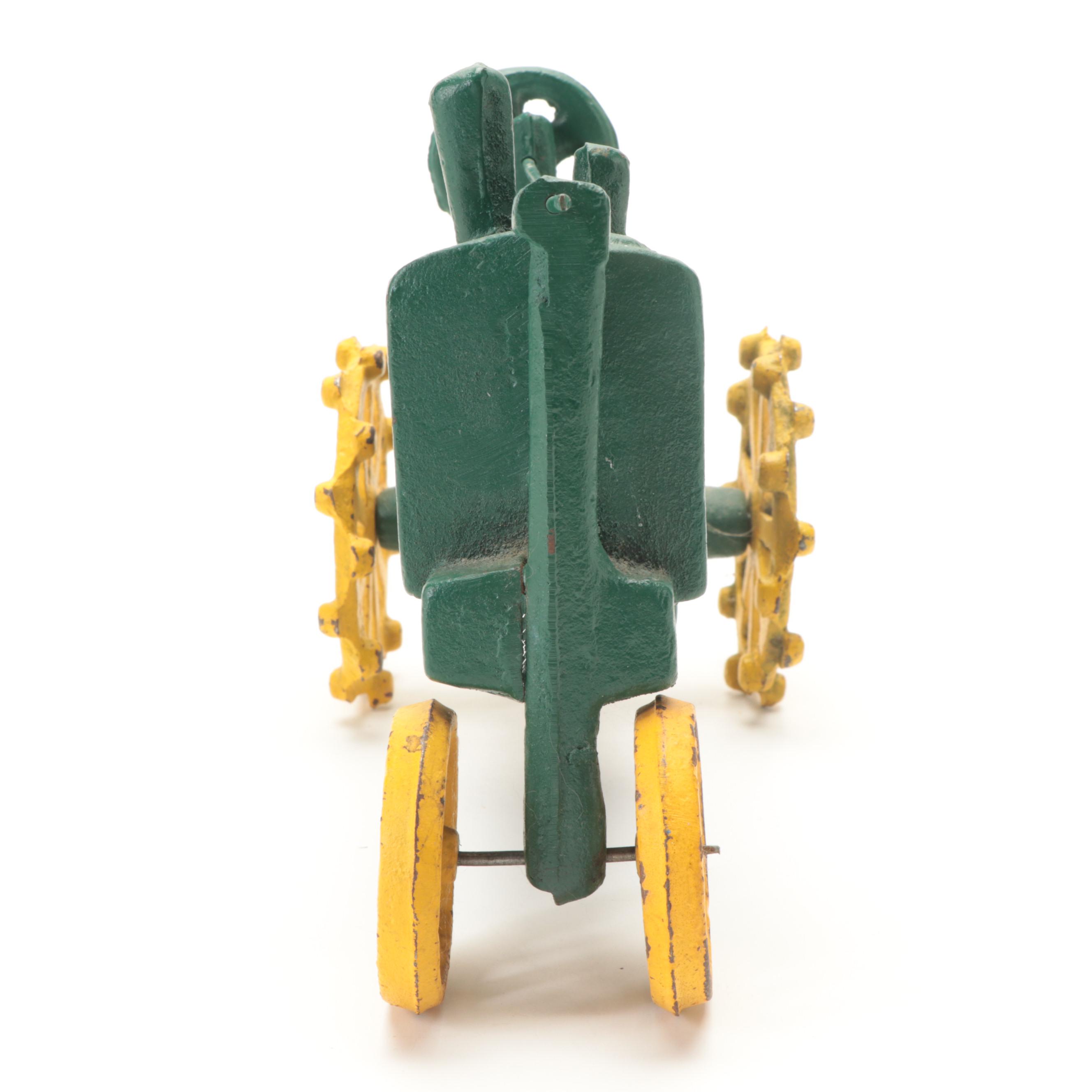 Painted Cast Iron John Deere Tractor Toy