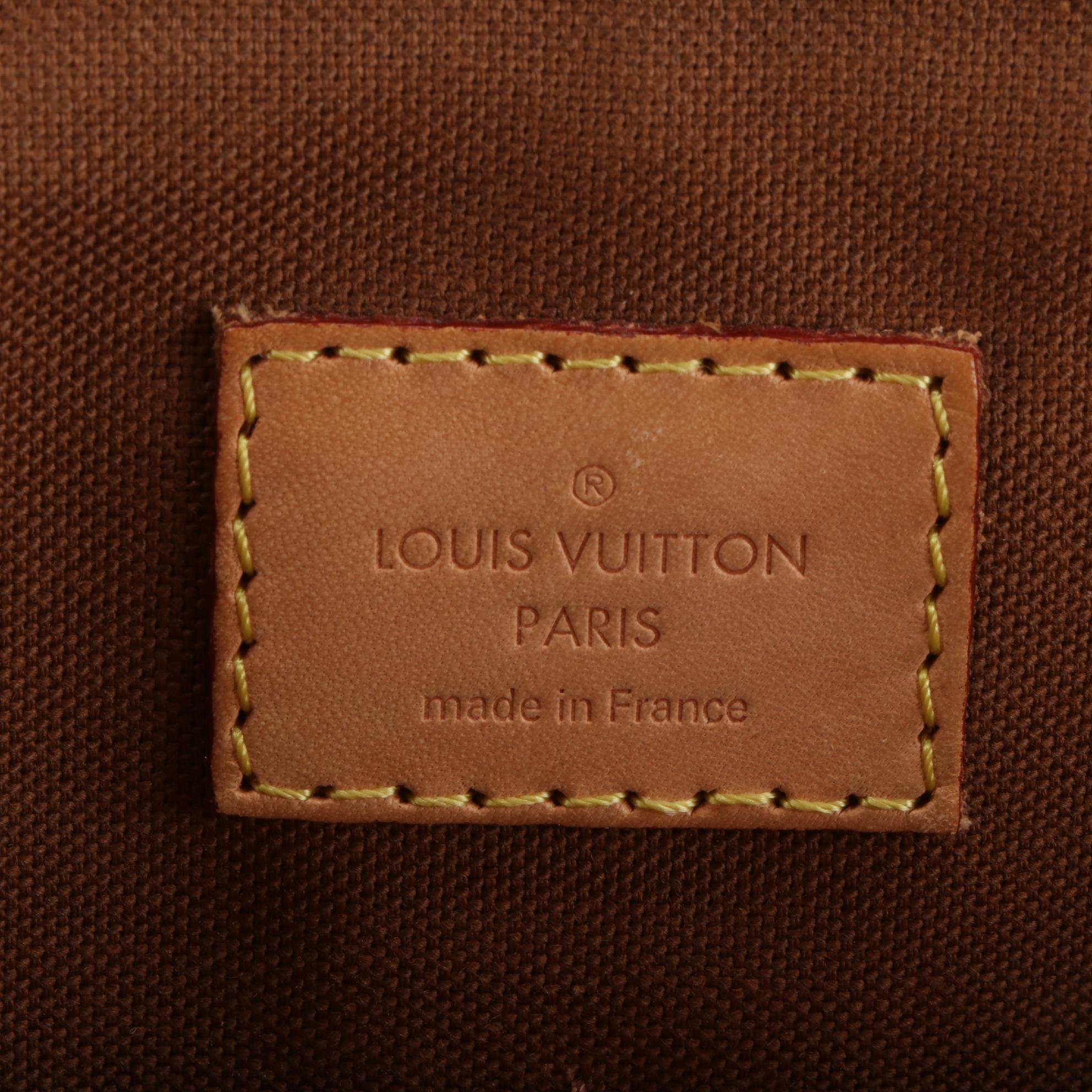 Louis Vuitton Tivoli PM Handbag in Monogram Canvas and Vachetta Leather