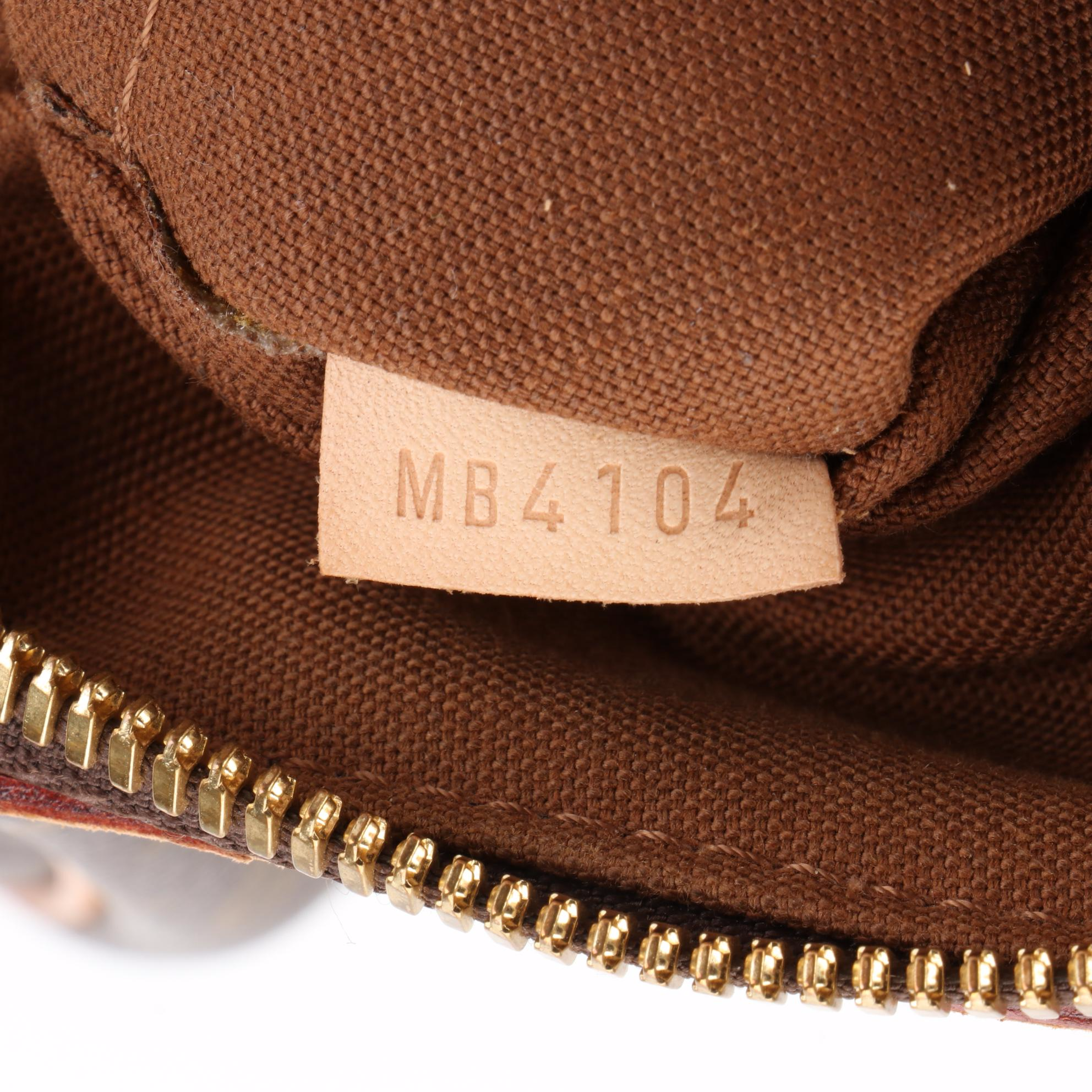 Louis Vuitton Tivoli PM Handbag in Monogram Canvas and Vachetta Leather