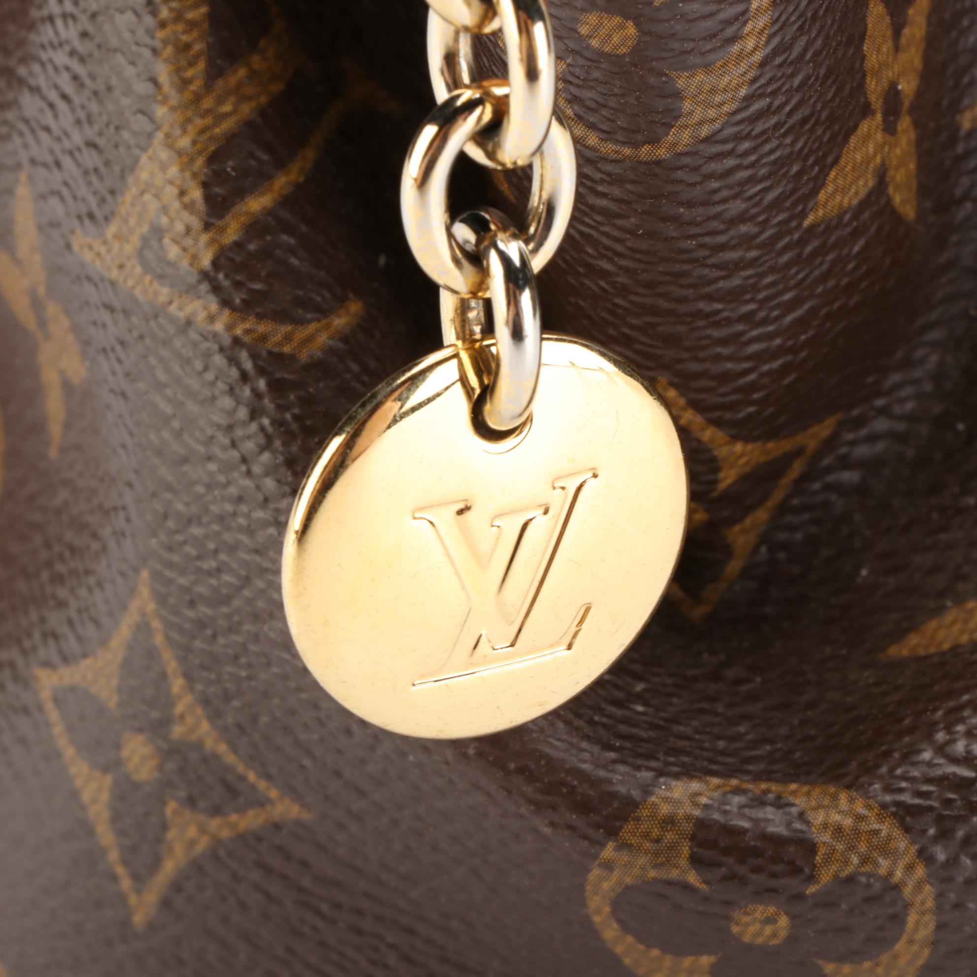 Louis Vuitton Tivoli PM Handbag in Monogram Canvas and Vachetta Leather