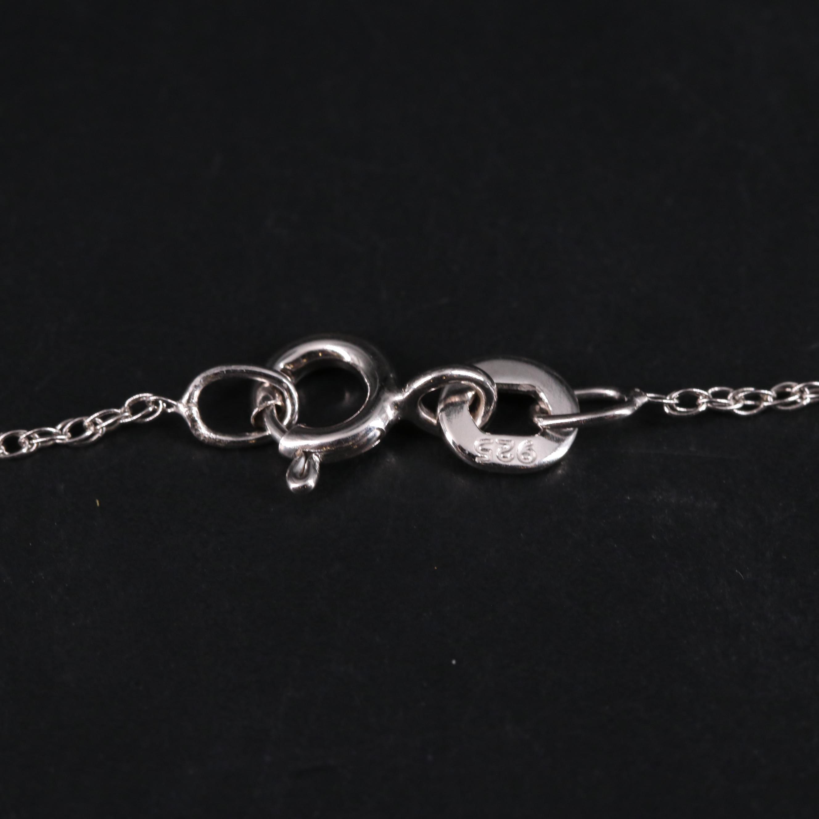 Sterling Silver Emerald and White Topaz Pendant Necklace