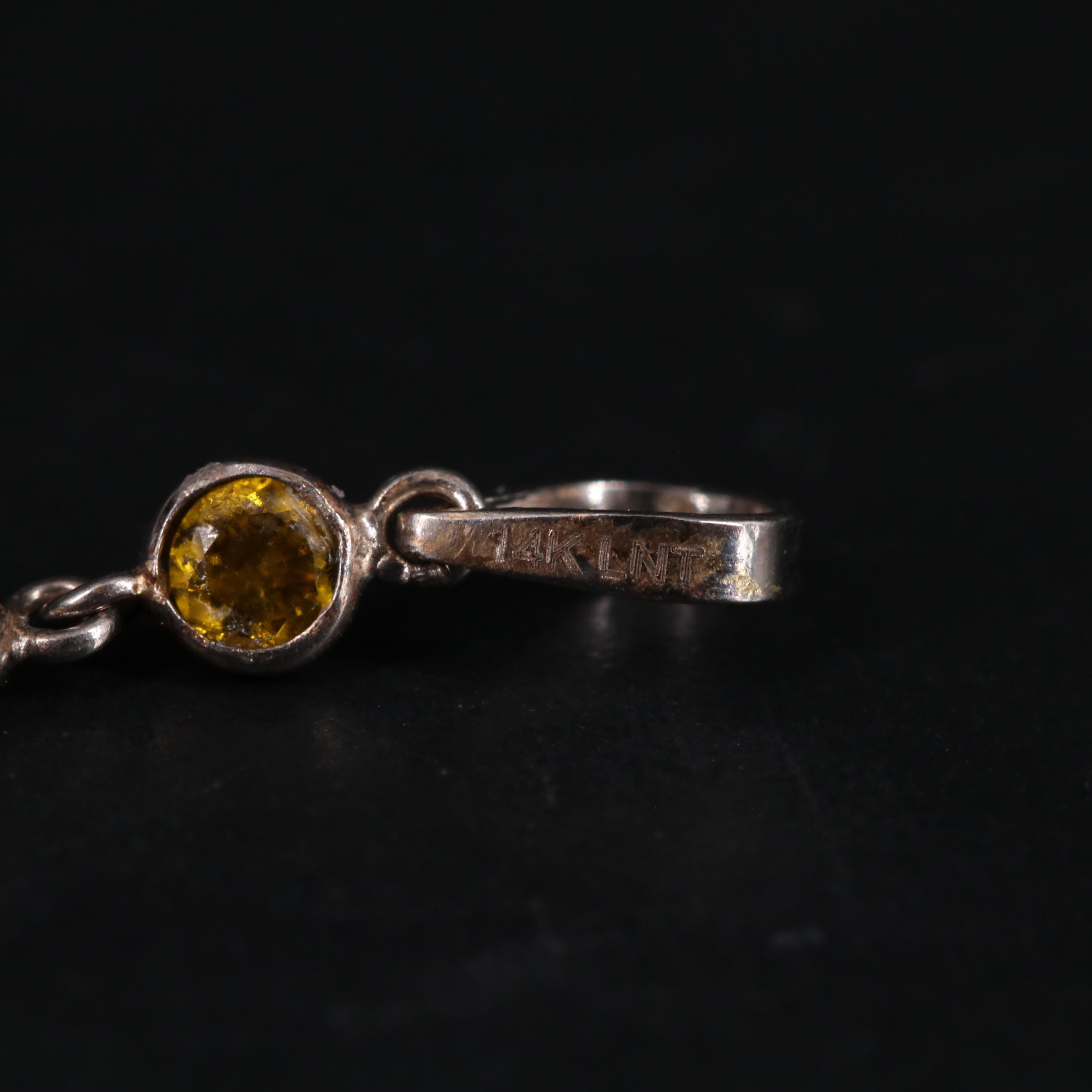 14K Golden Rutile Pendant