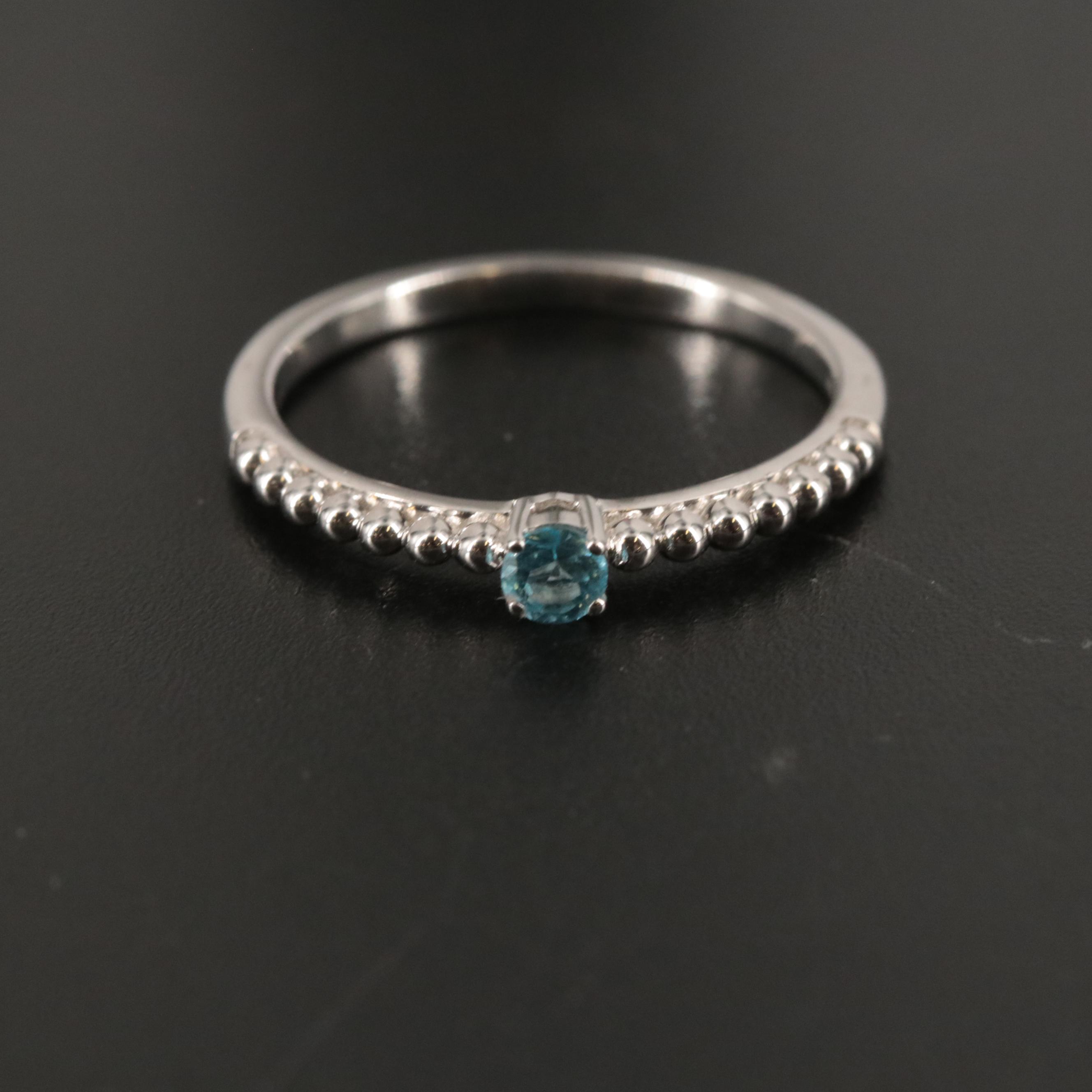Sterling Topaz Side Stone Ring