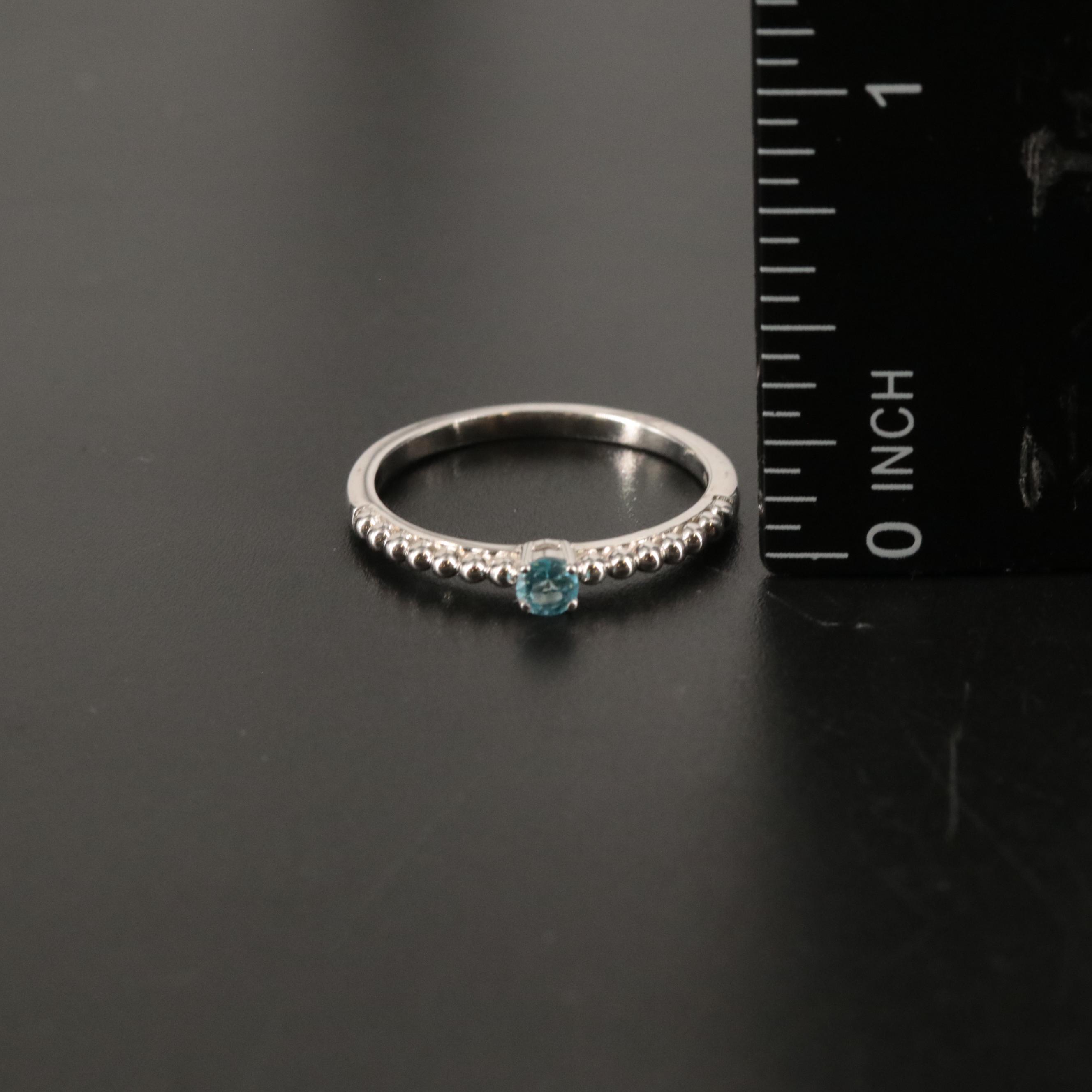 Sterling Topaz Side Stone Ring