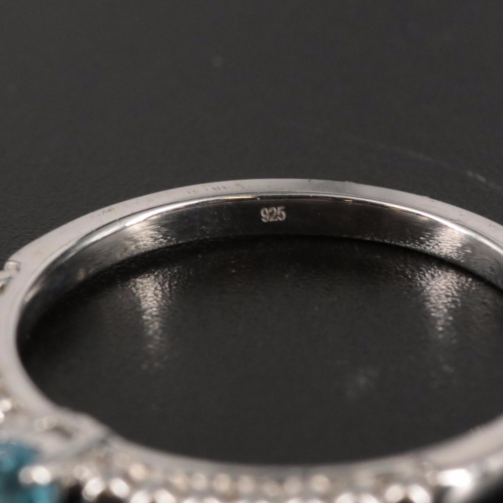 Sterling Topaz Side Stone Ring