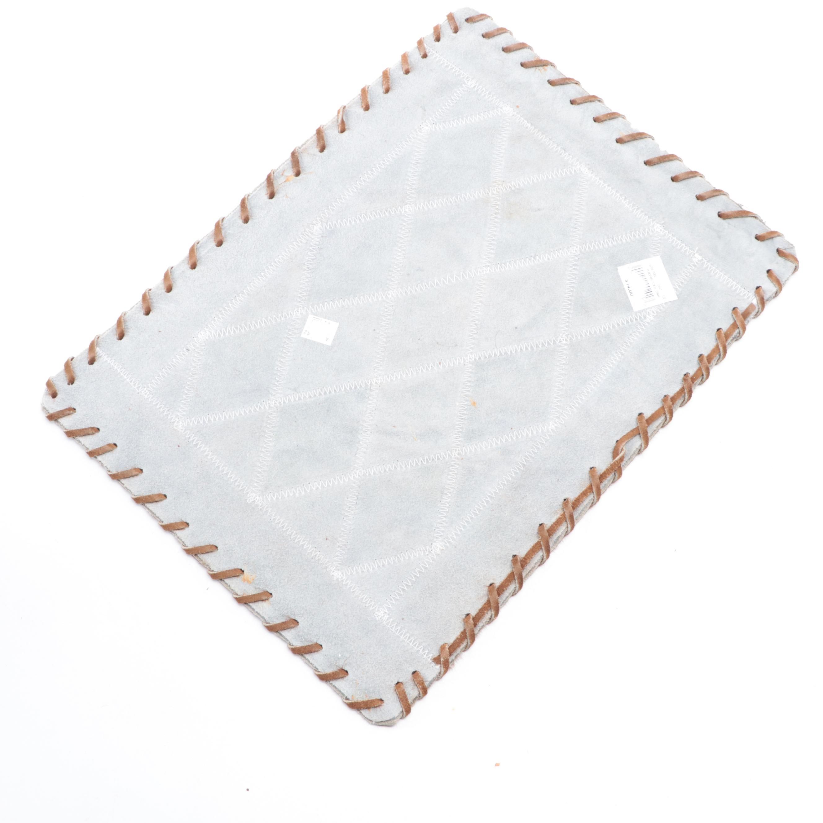 Horse Hair Diamond Patchwork Placemat and Calf Hide Bolster Pillow