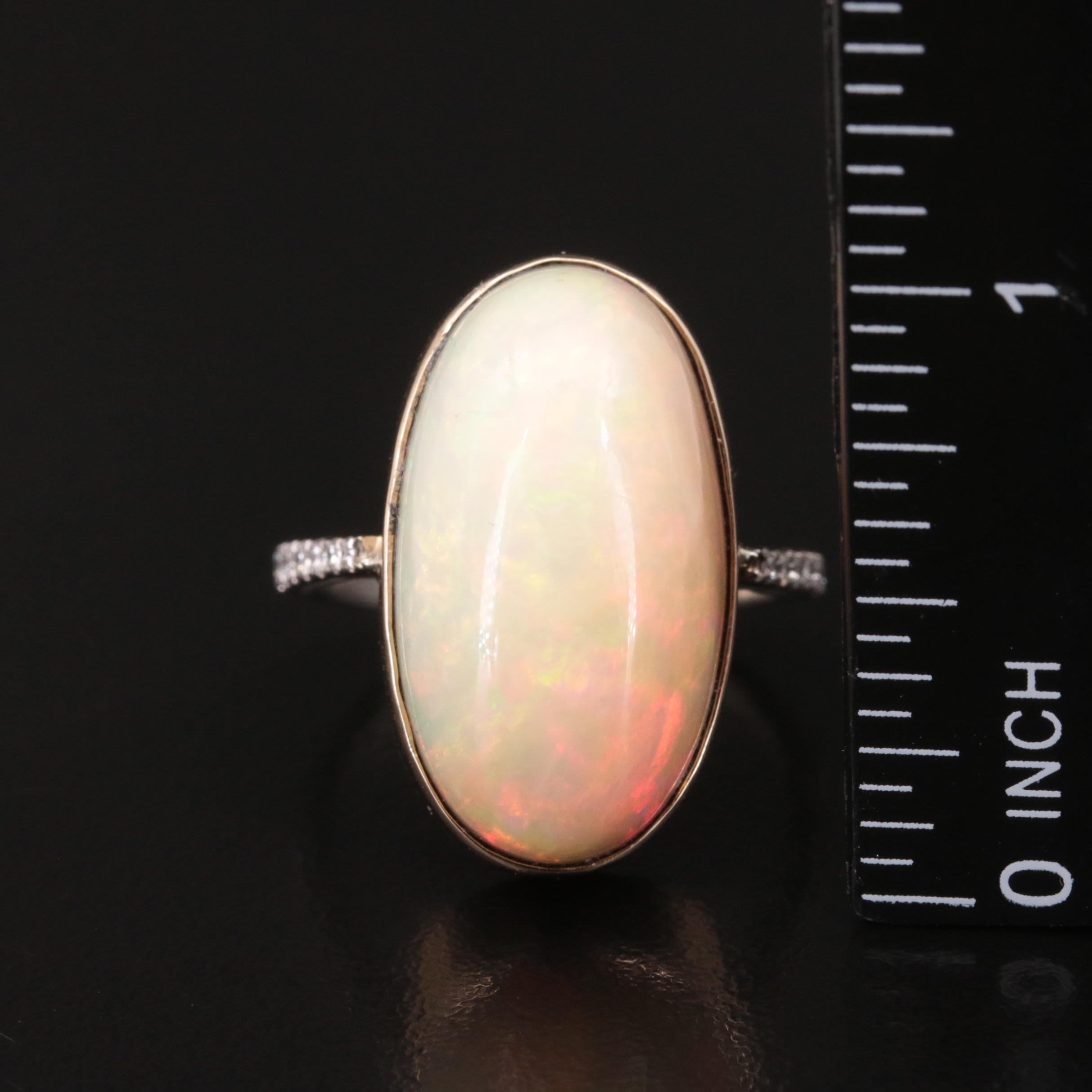 14K 19.56 CT Opal and Diamond Ring