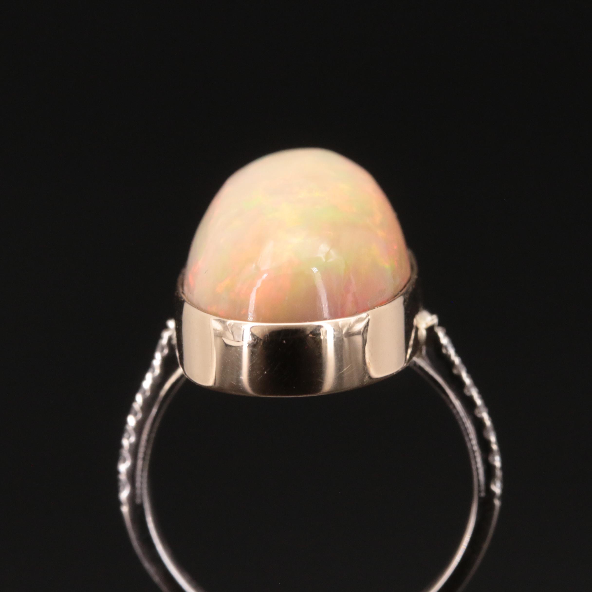 14K 19.56 CT Opal and Diamond Ring
