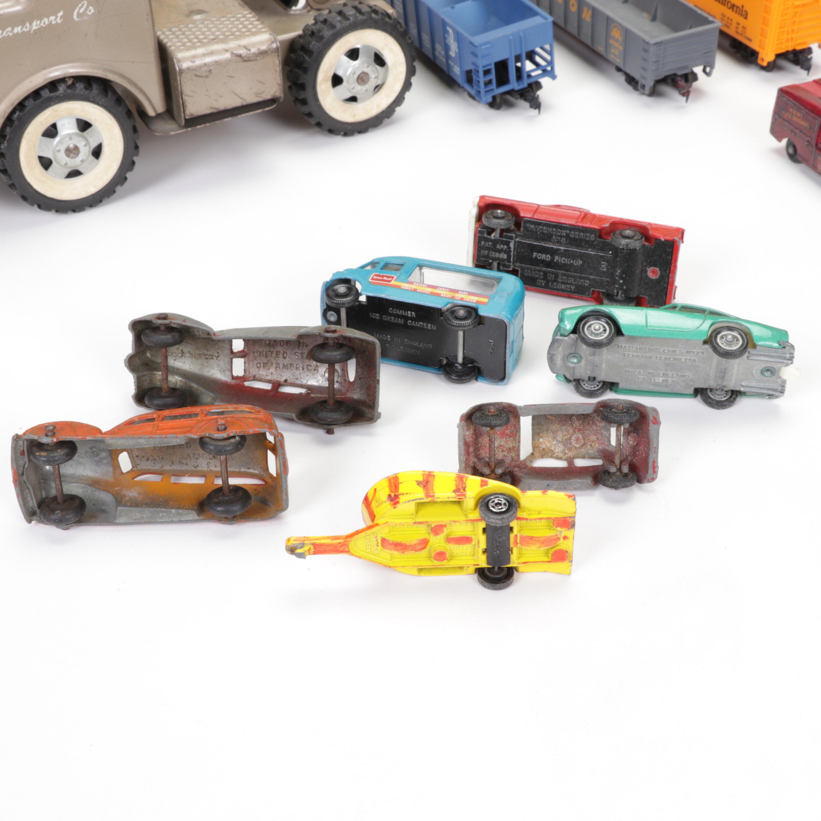 Tonka Car Carrier, Tyco Model Train Cars, and More Toy Vehicles