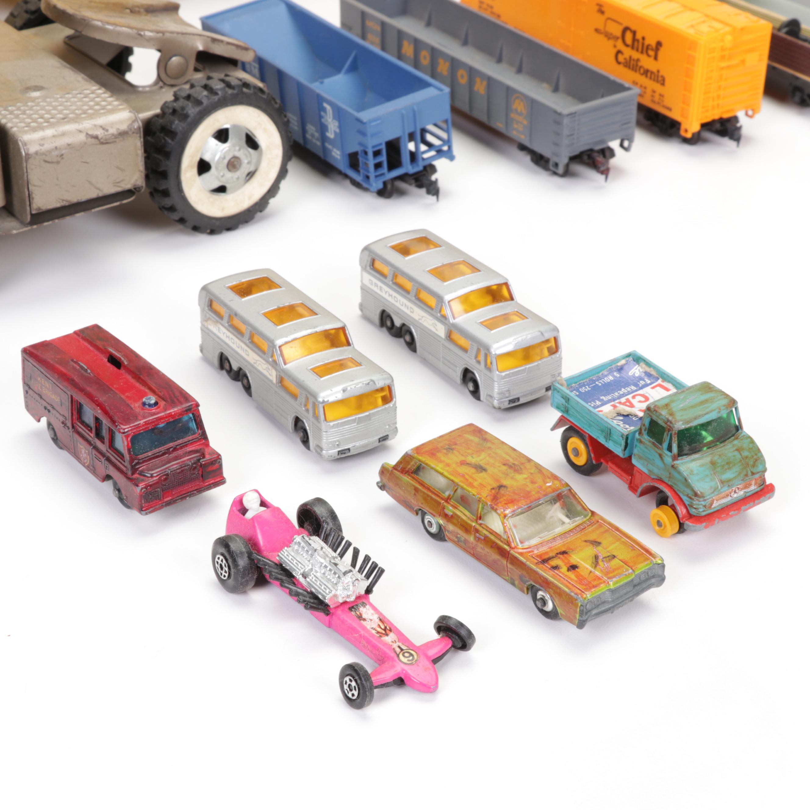 Tonka Car Carrier, Tyco Model Train Cars, and More Toy Vehicles
