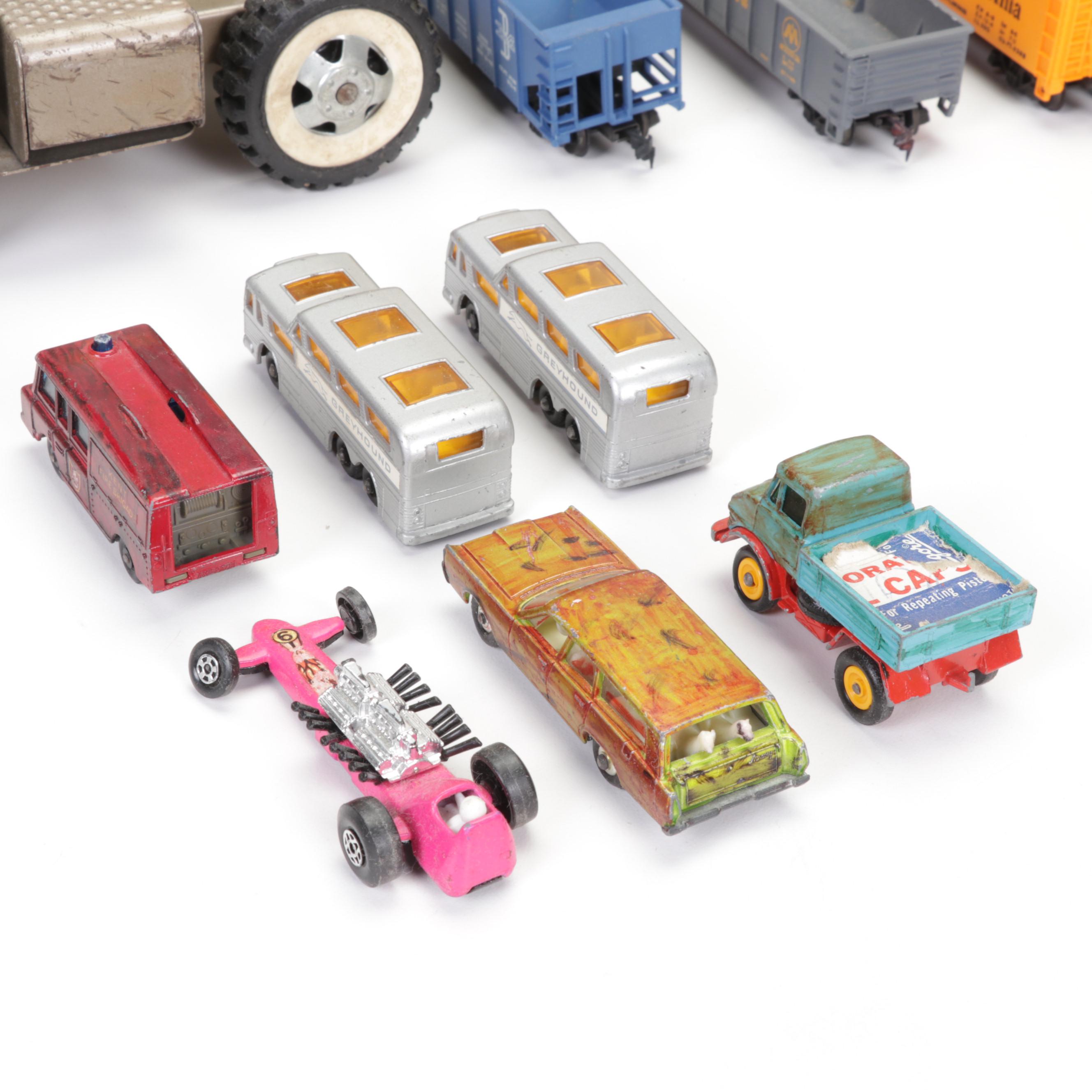 Tonka Car Carrier, Tyco Model Train Cars, and More Toy Vehicles