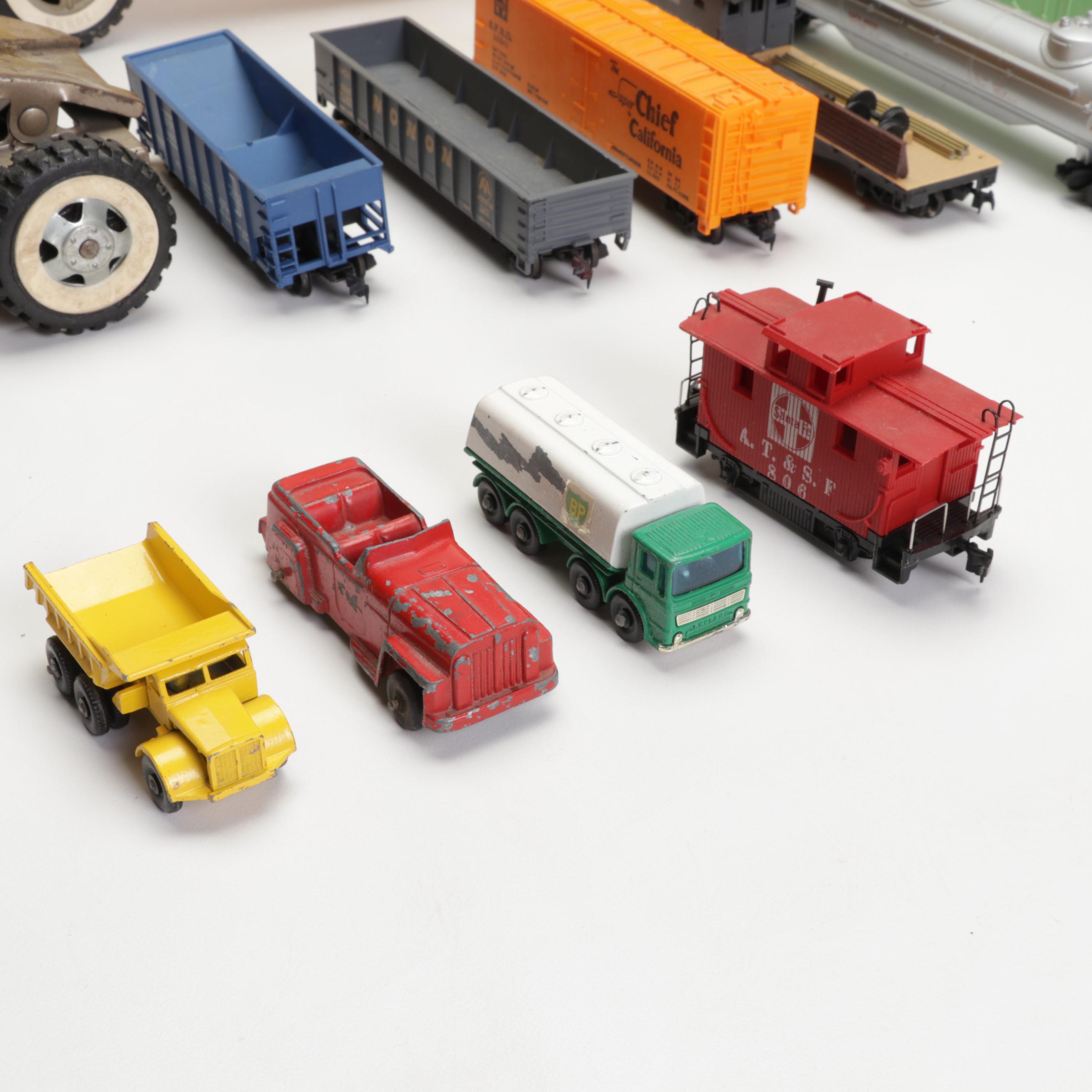 Tonka Car Carrier, Tyco Model Train Cars, and More Toy Vehicles