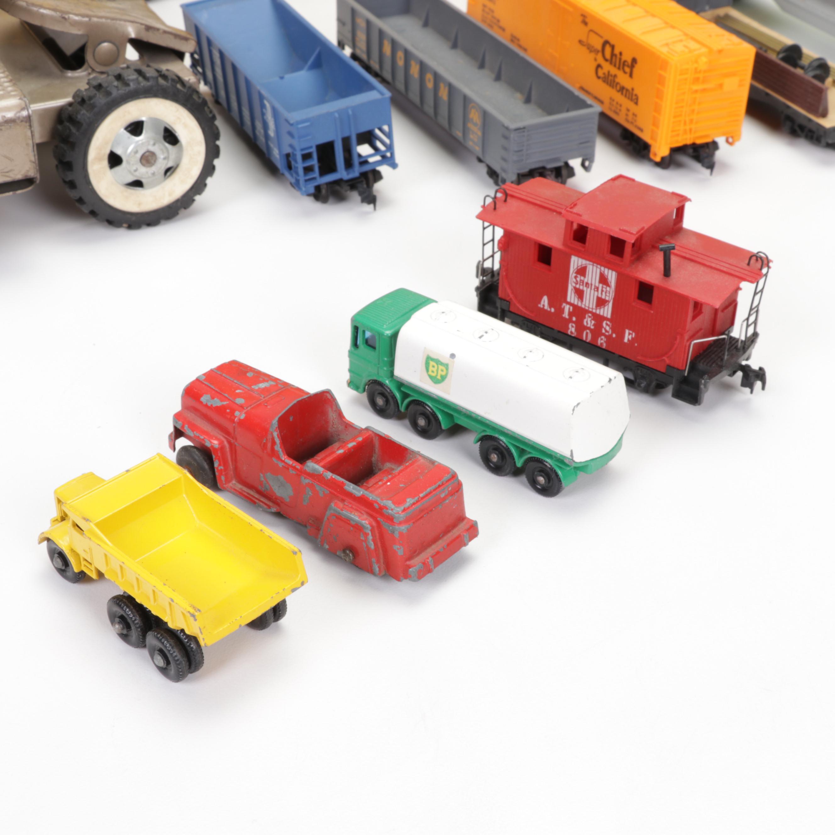 Tonka Car Carrier, Tyco Model Train Cars, and More Toy Vehicles