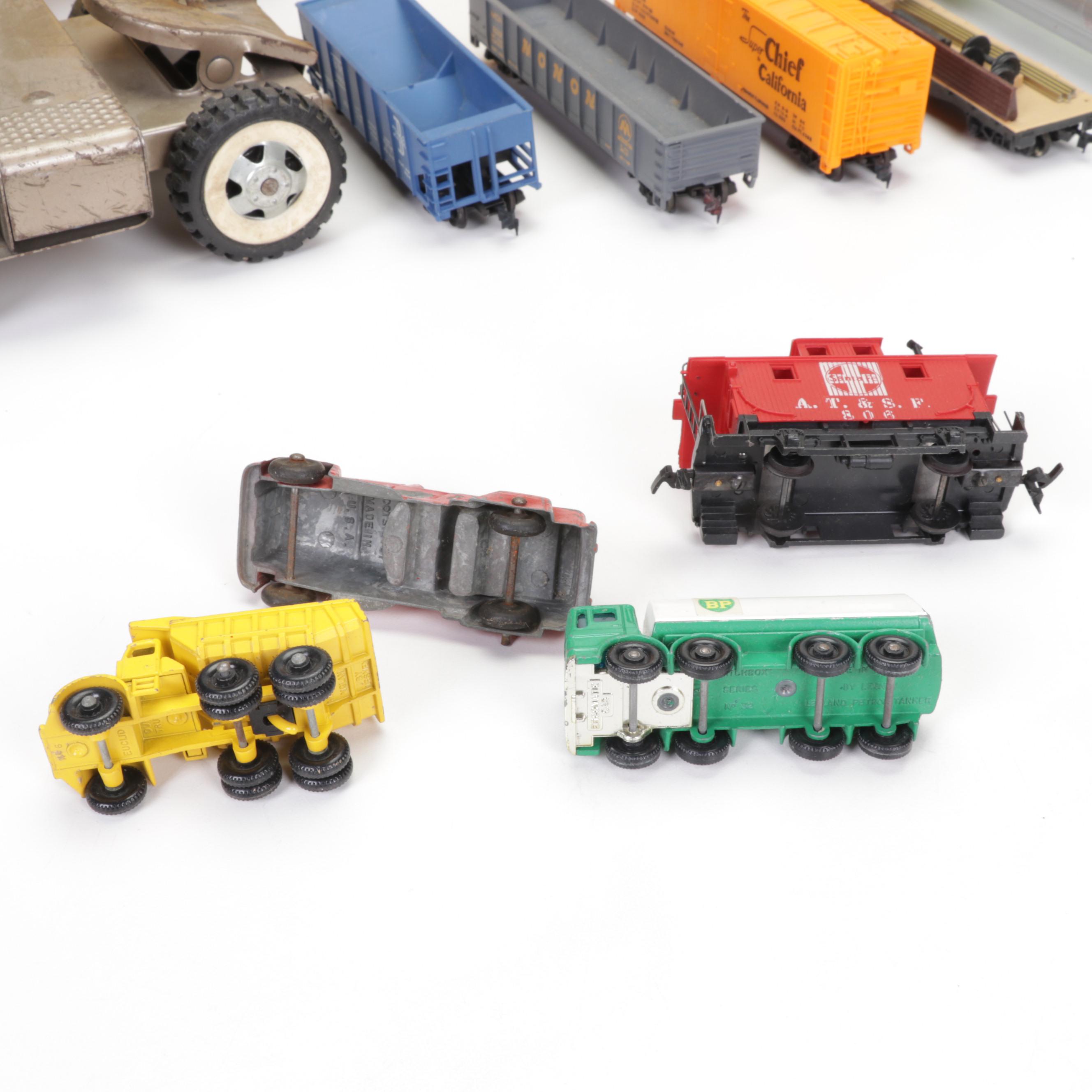Tonka Car Carrier, Tyco Model Train Cars, and More Toy Vehicles