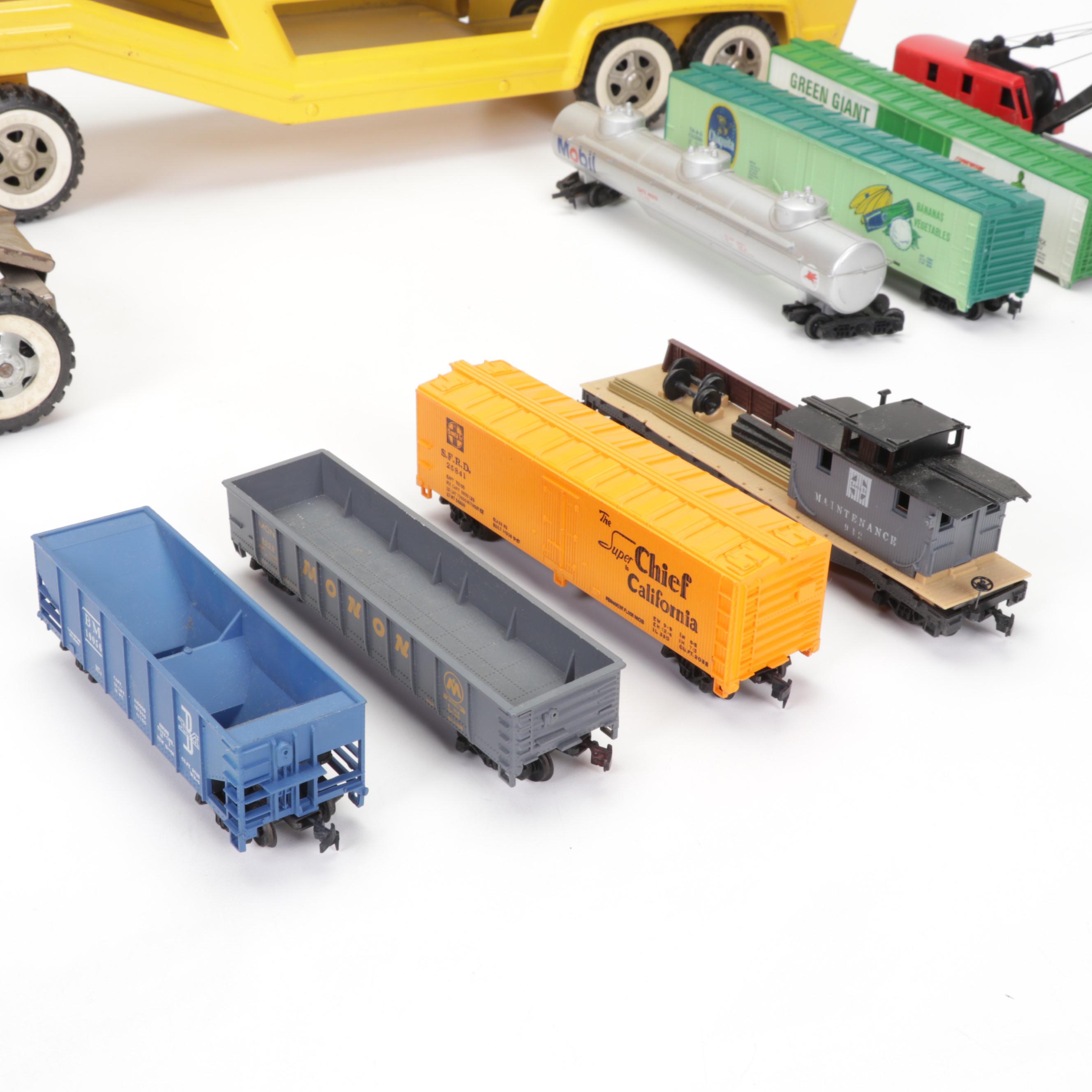 Tonka Car Carrier, Tyco Model Train Cars, and More Toy Vehicles