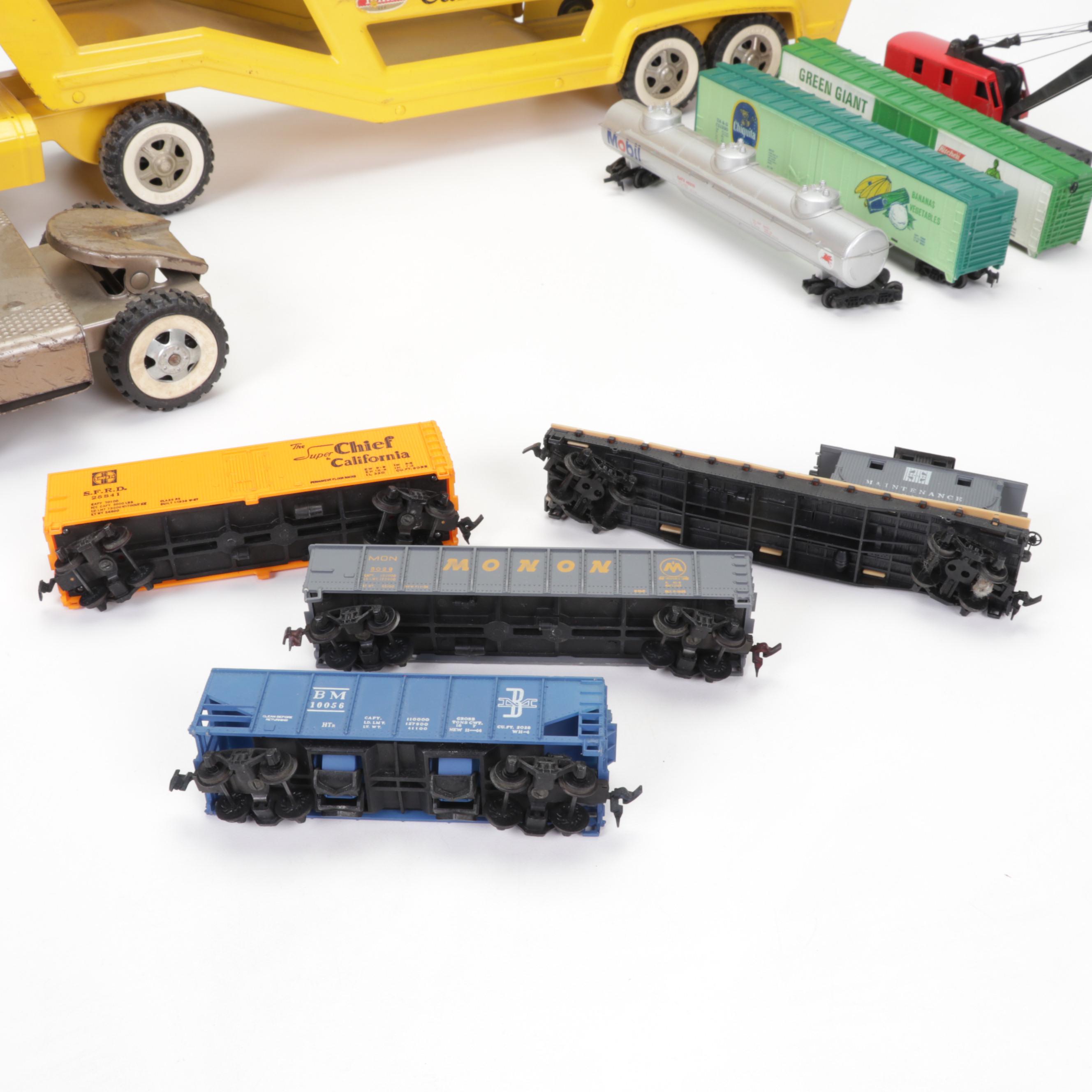 Tonka Car Carrier, Tyco Model Train Cars, and More Toy Vehicles