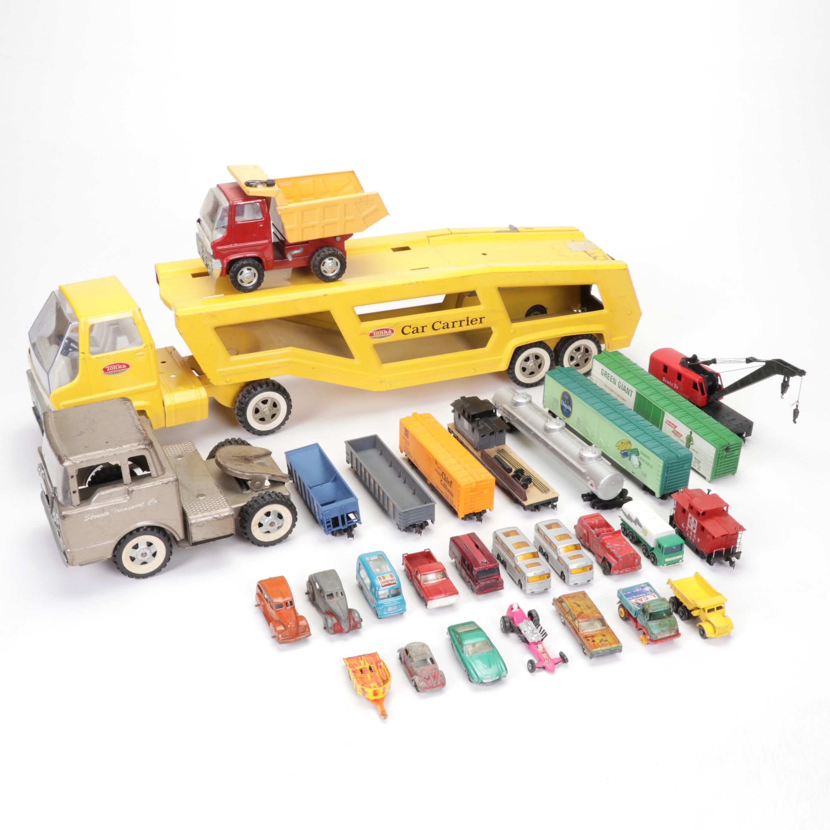 Tonka Car Carrier, Tyco Model Train Cars, and More Toy Vehicles