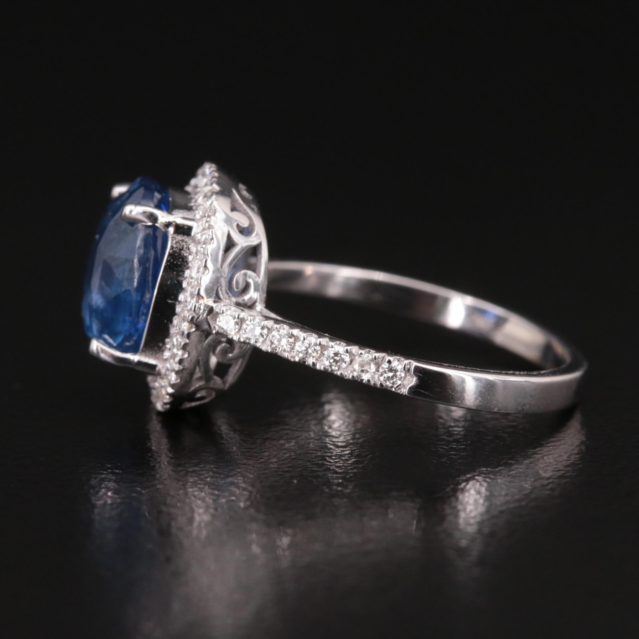 18K 3.76 CT Sapphire and Diamond Halo Ring