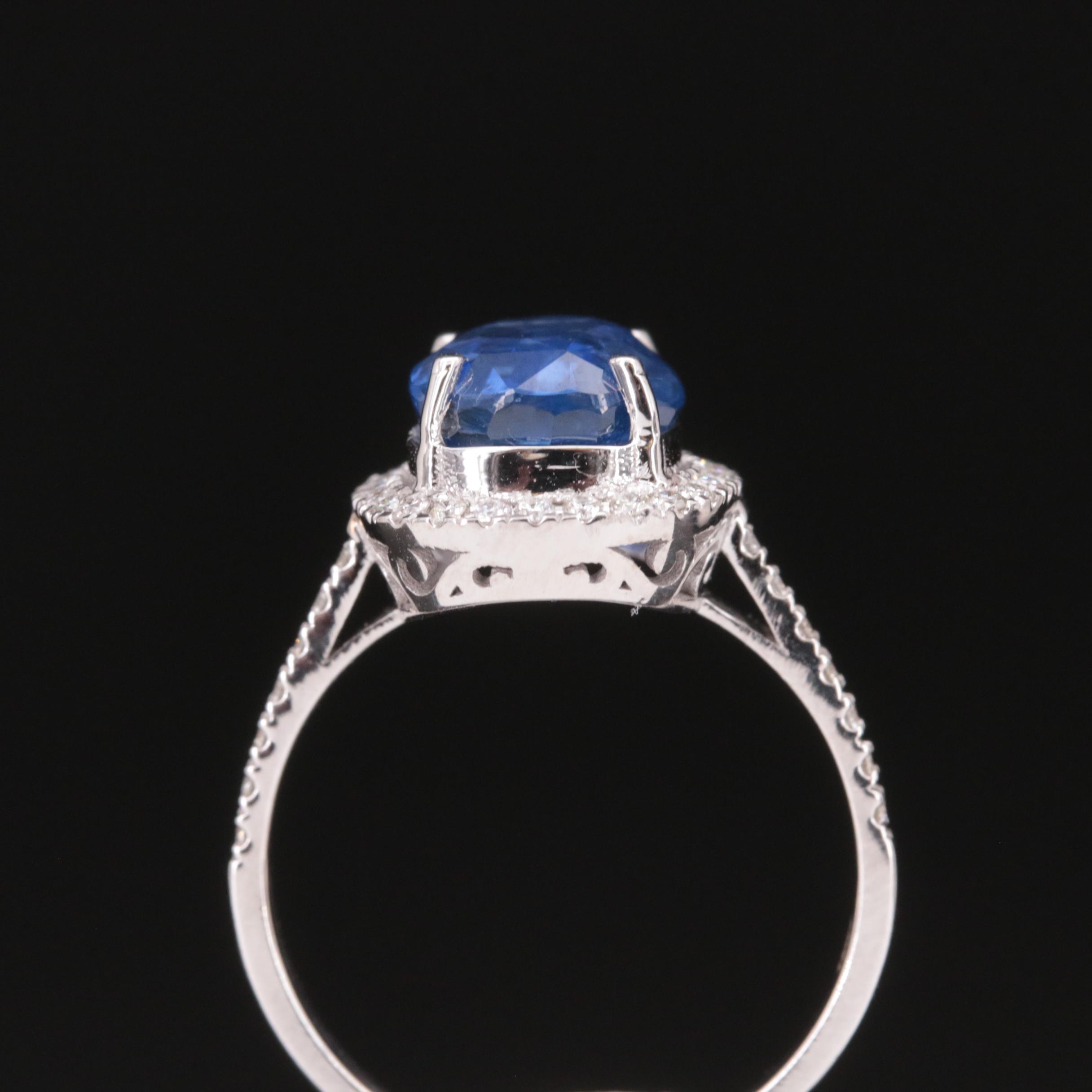18K 3.76 CT Sapphire and Diamond Halo Ring