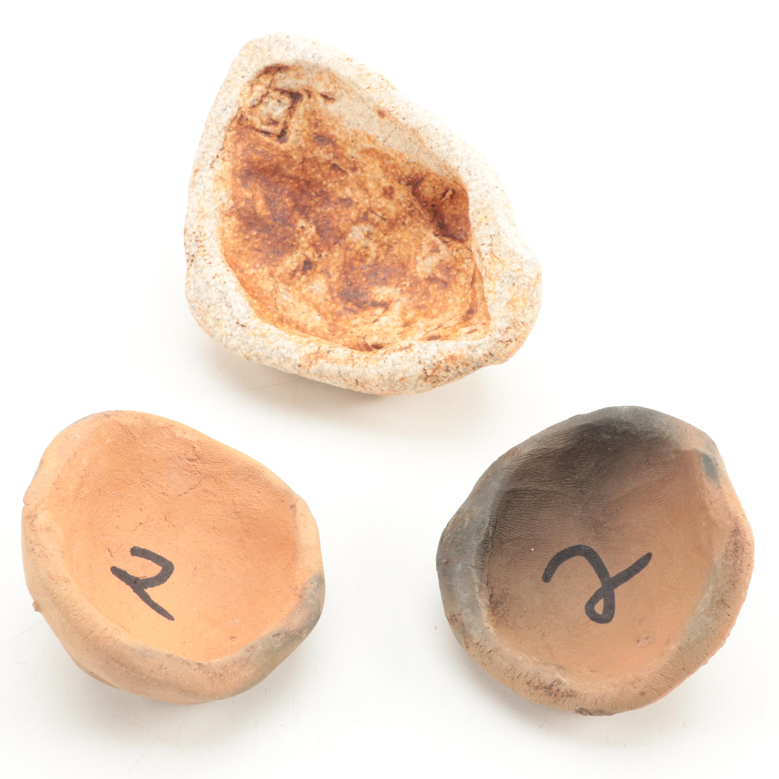 Richard M. Ball Signed Carved Stone Face with Other Stone and Ceramic Faces