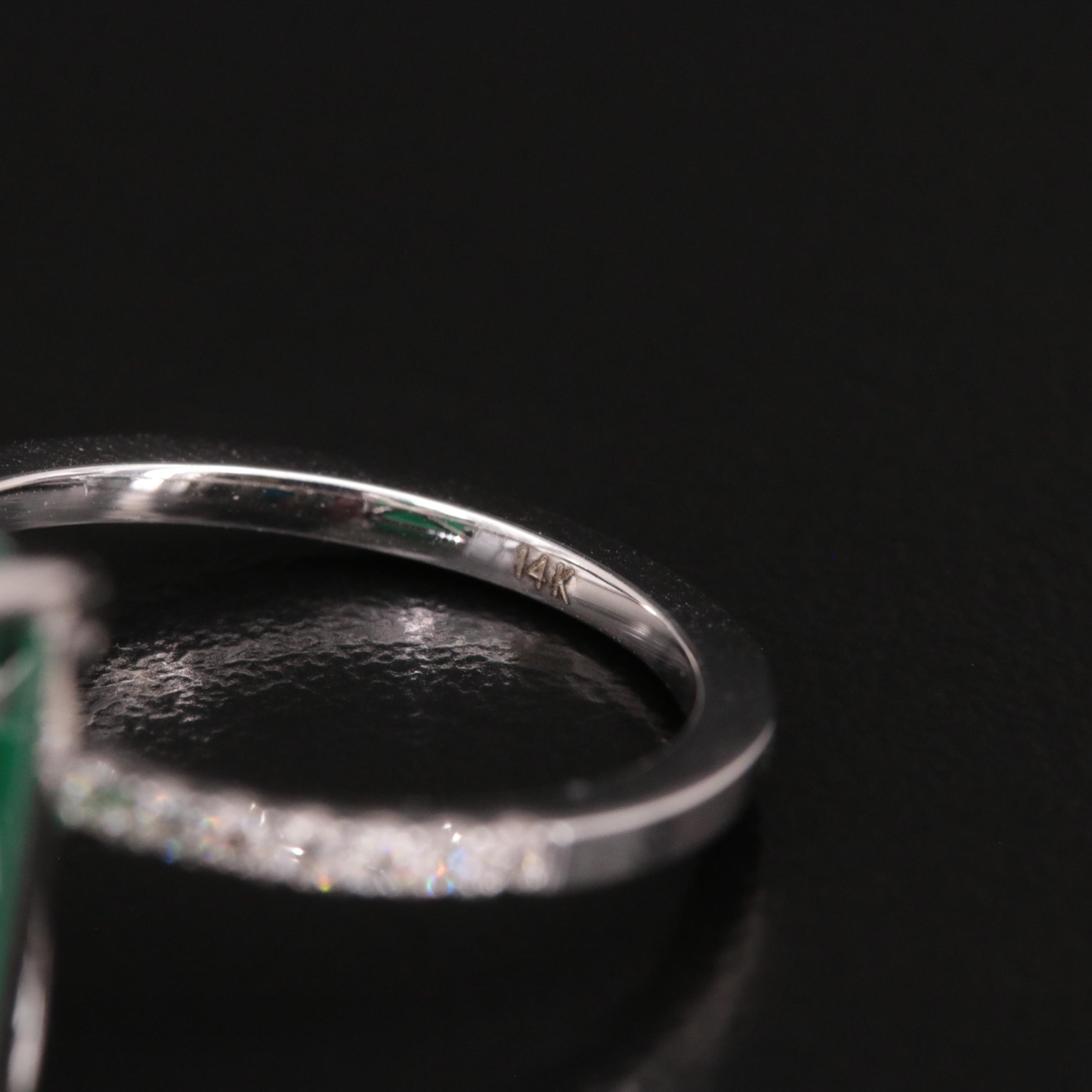 14K 7.62 CT Emerald Ring with Diamond Shoulders