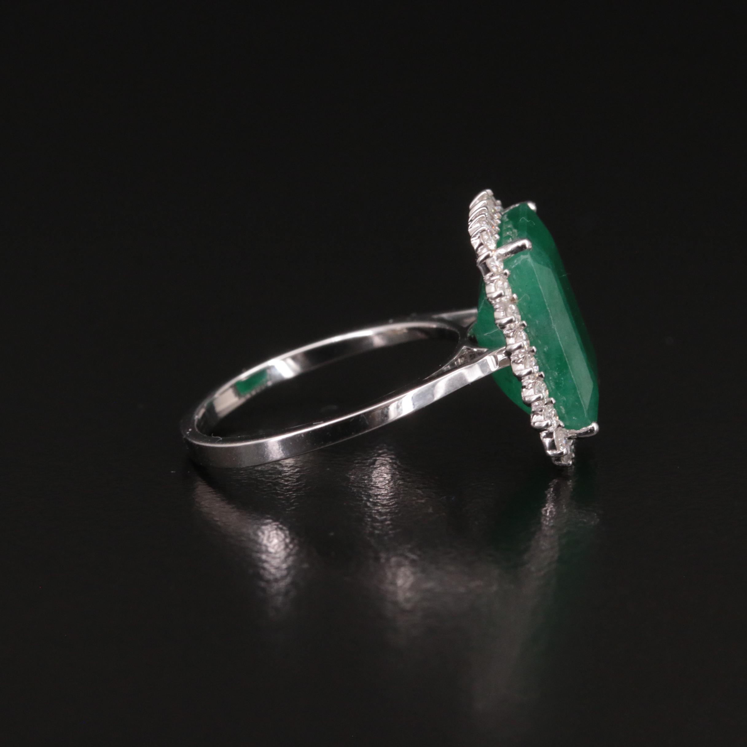 18K 6.87 CT Emerald and Diamond Ring