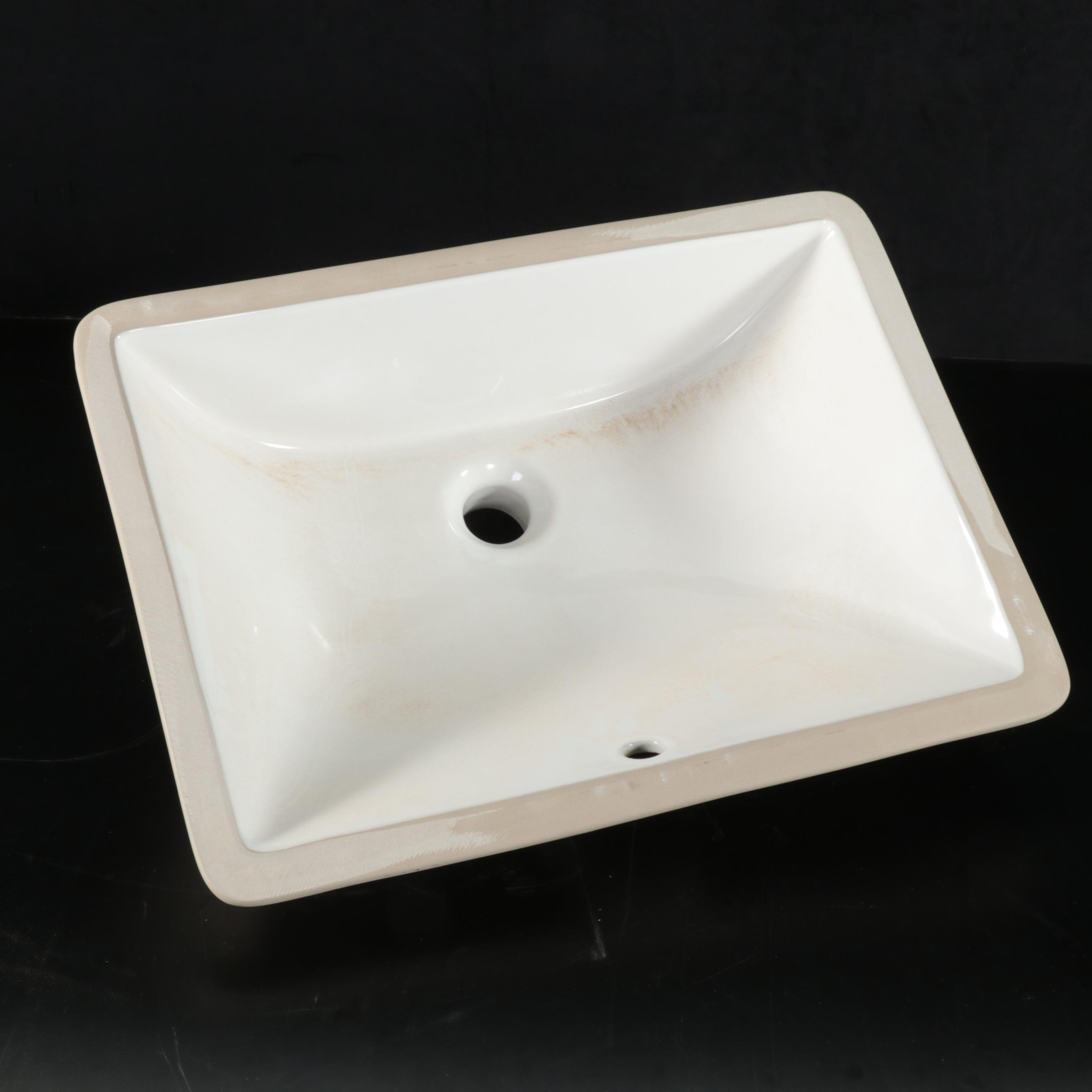 Undermount Porcelain Sink with Polished Brass Finish Widespread Faucet