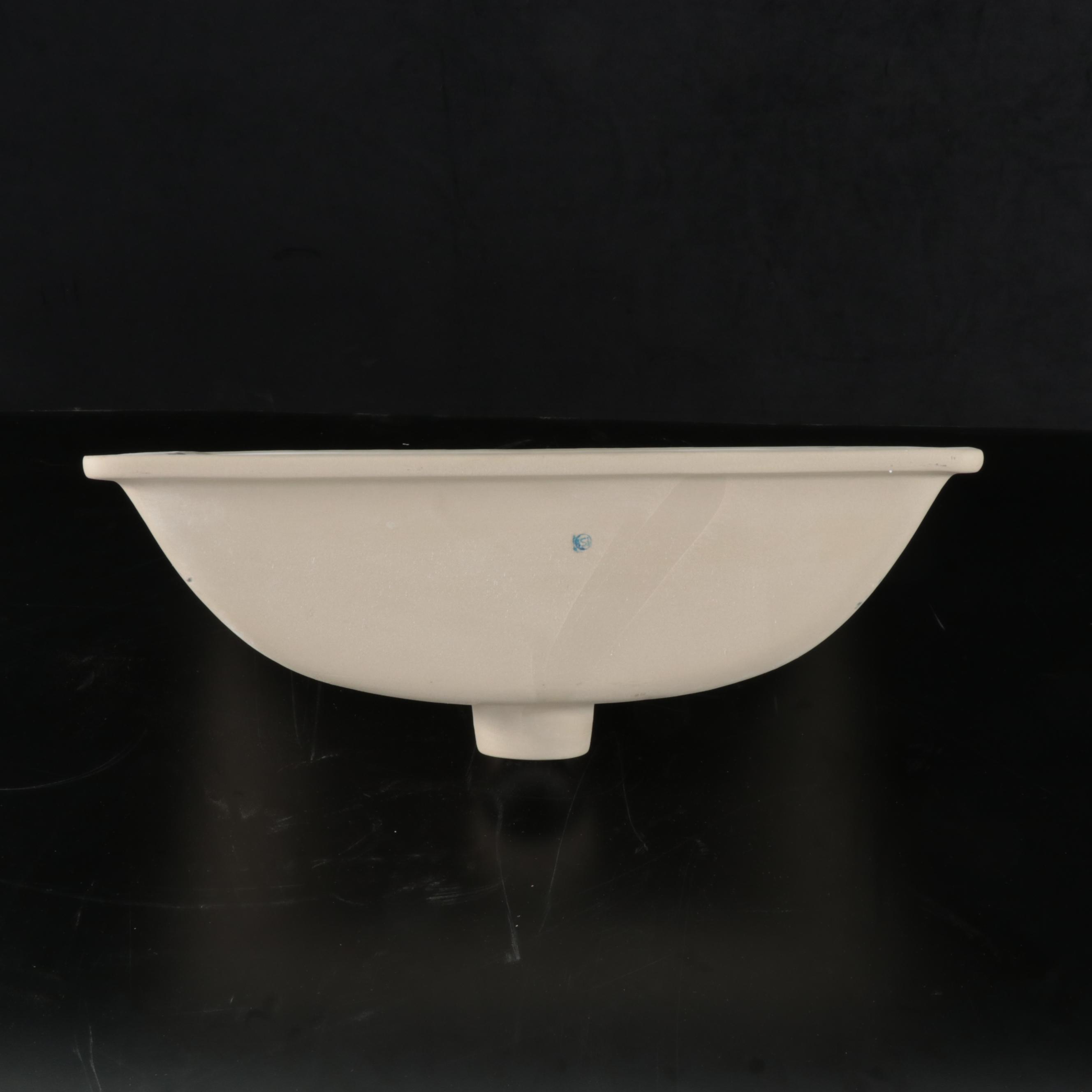 Undermount Porcelain Sink with Polished Brass Finish Widespread Faucet