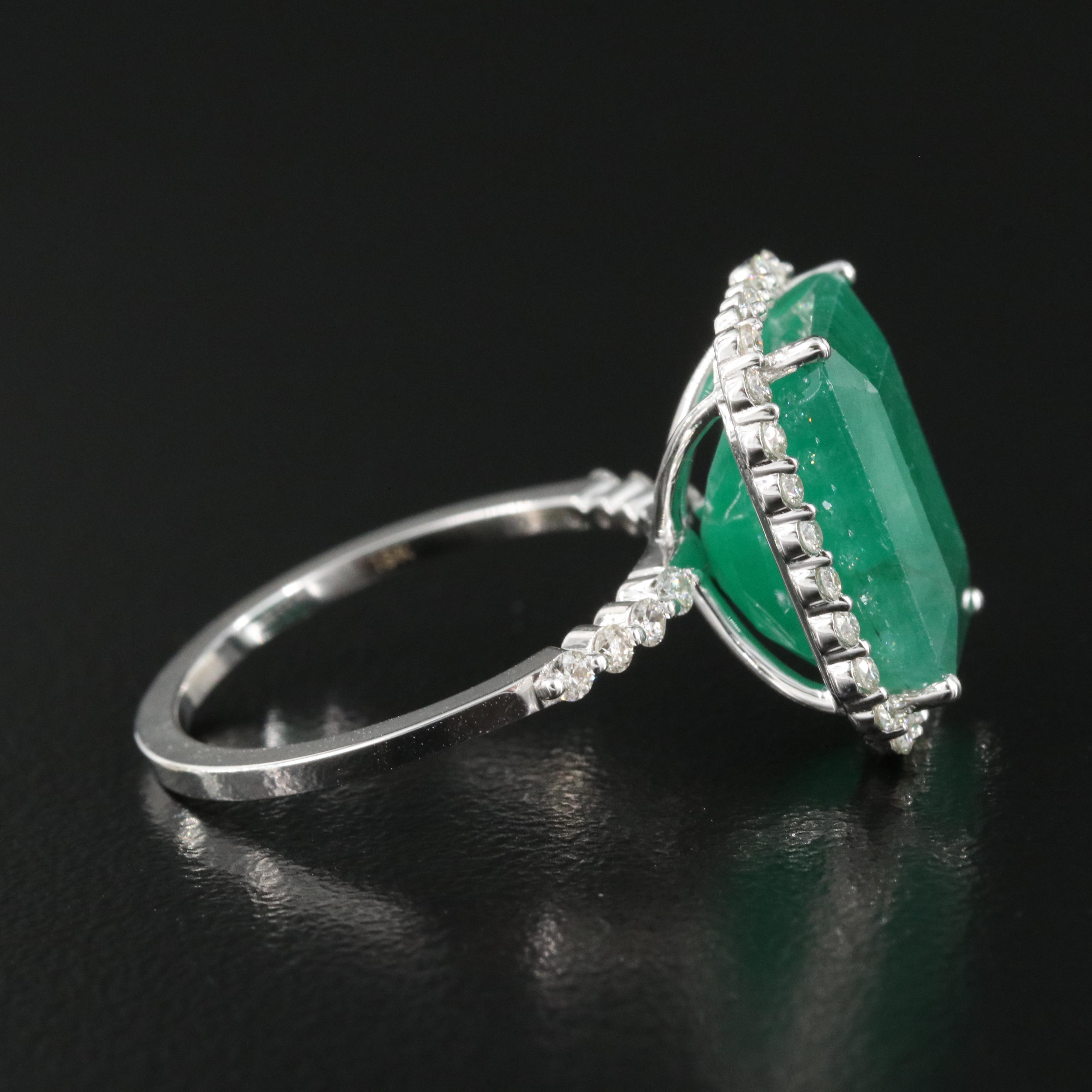 18K 7.62 CT Emerald and Diamond Halo Ring