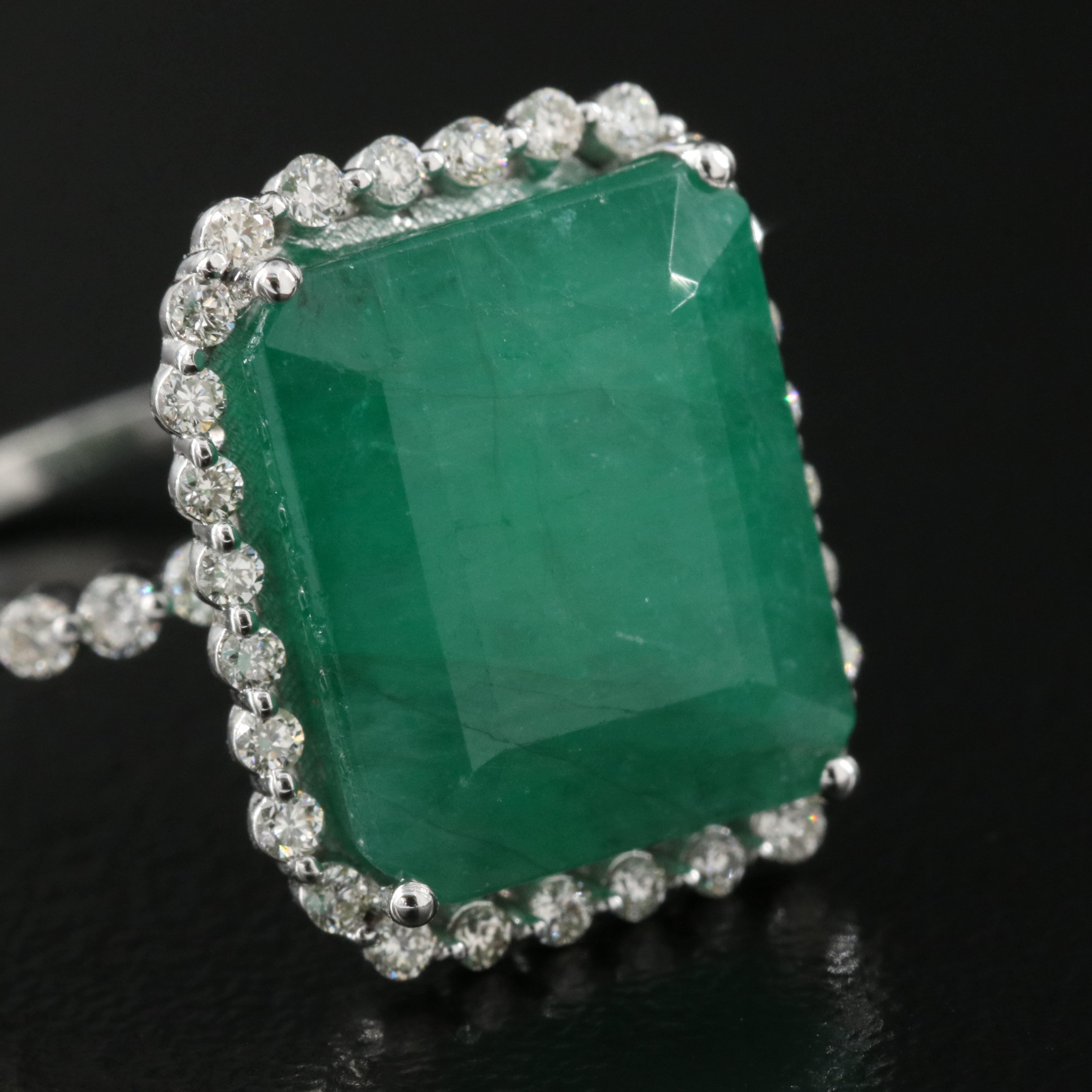 18K 7.62 CT Emerald and Diamond Halo Ring