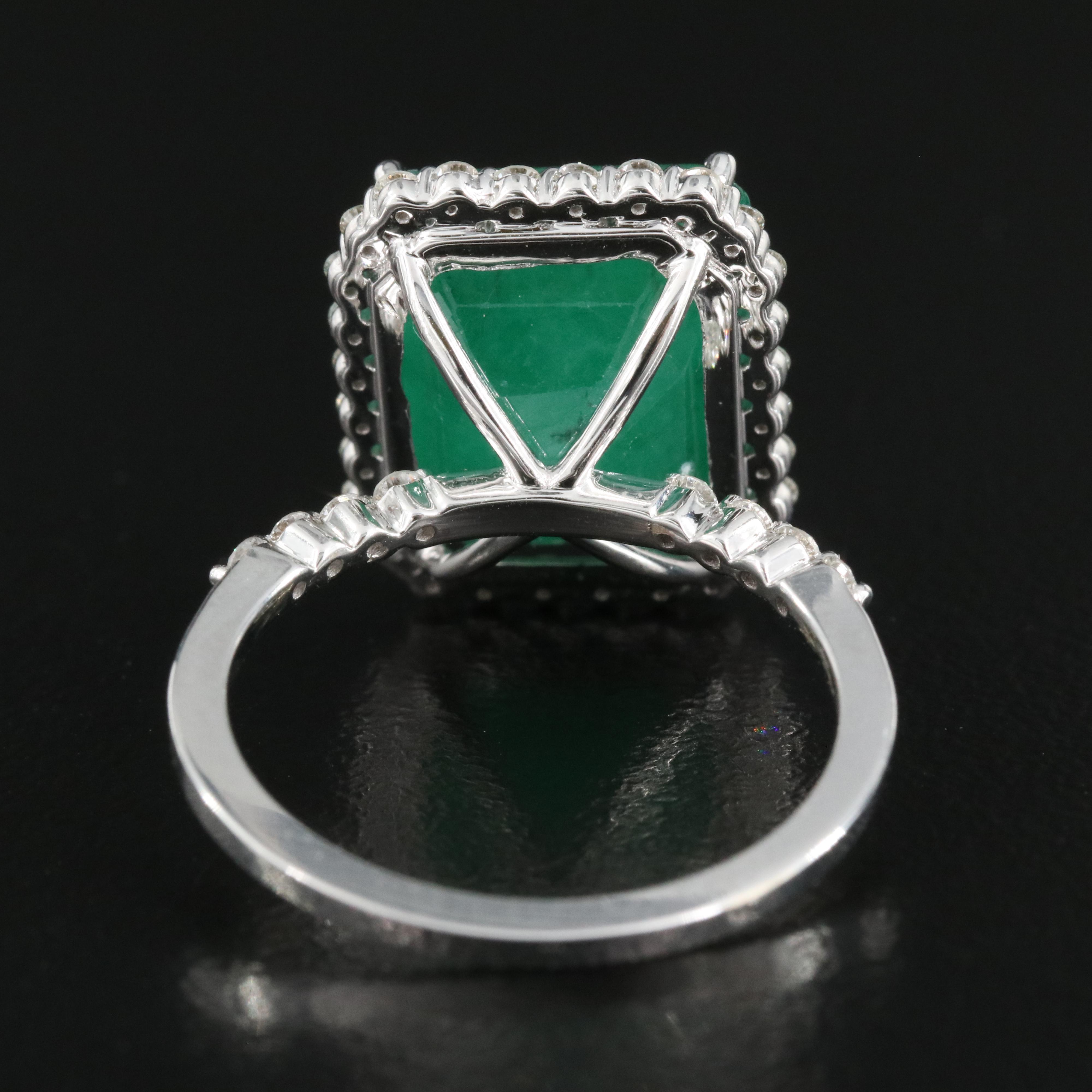 18K 7.62 CT Emerald and Diamond Halo Ring