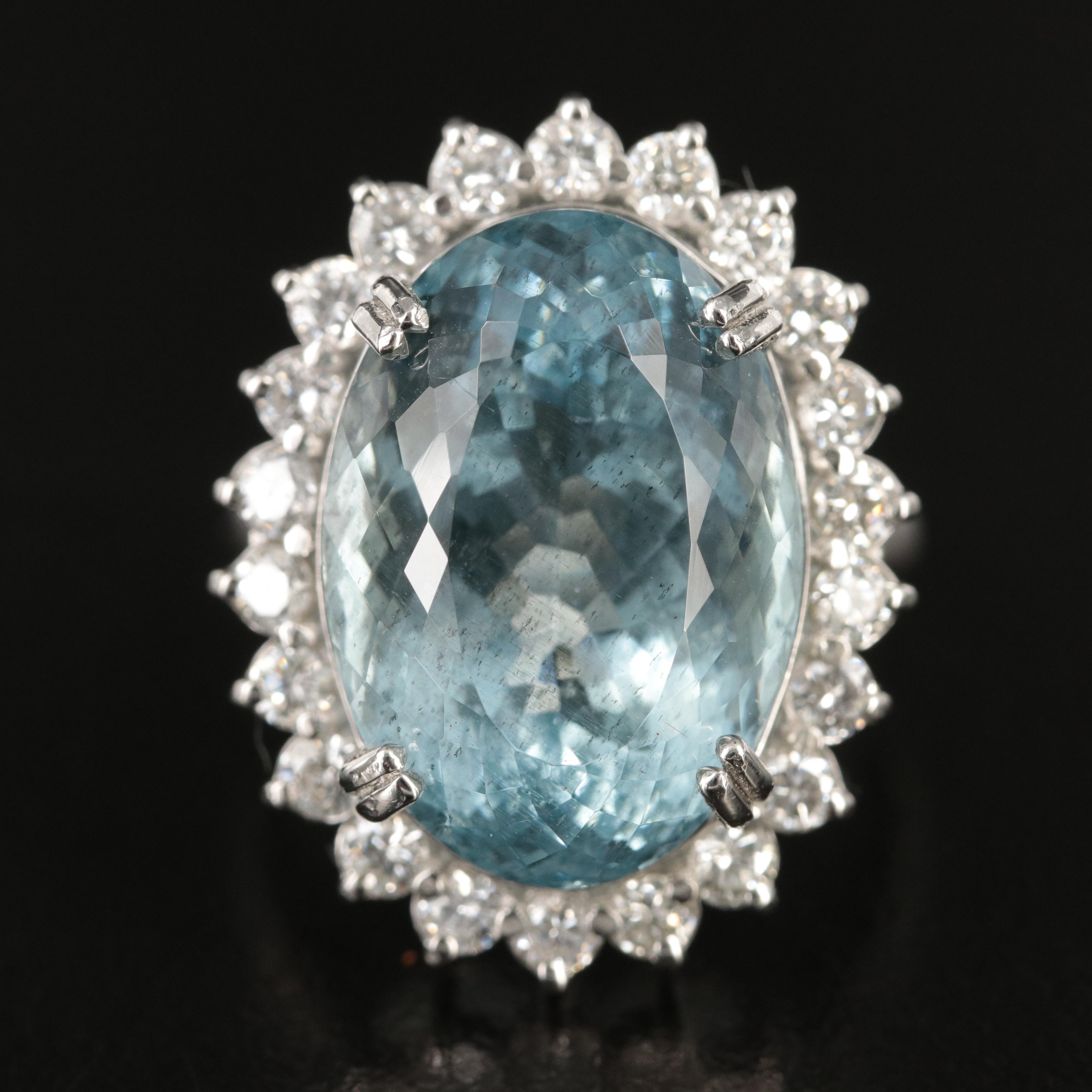 Platinum 16.17 CT Aquamarine and 1.20 CTW Diamond Halo Ring