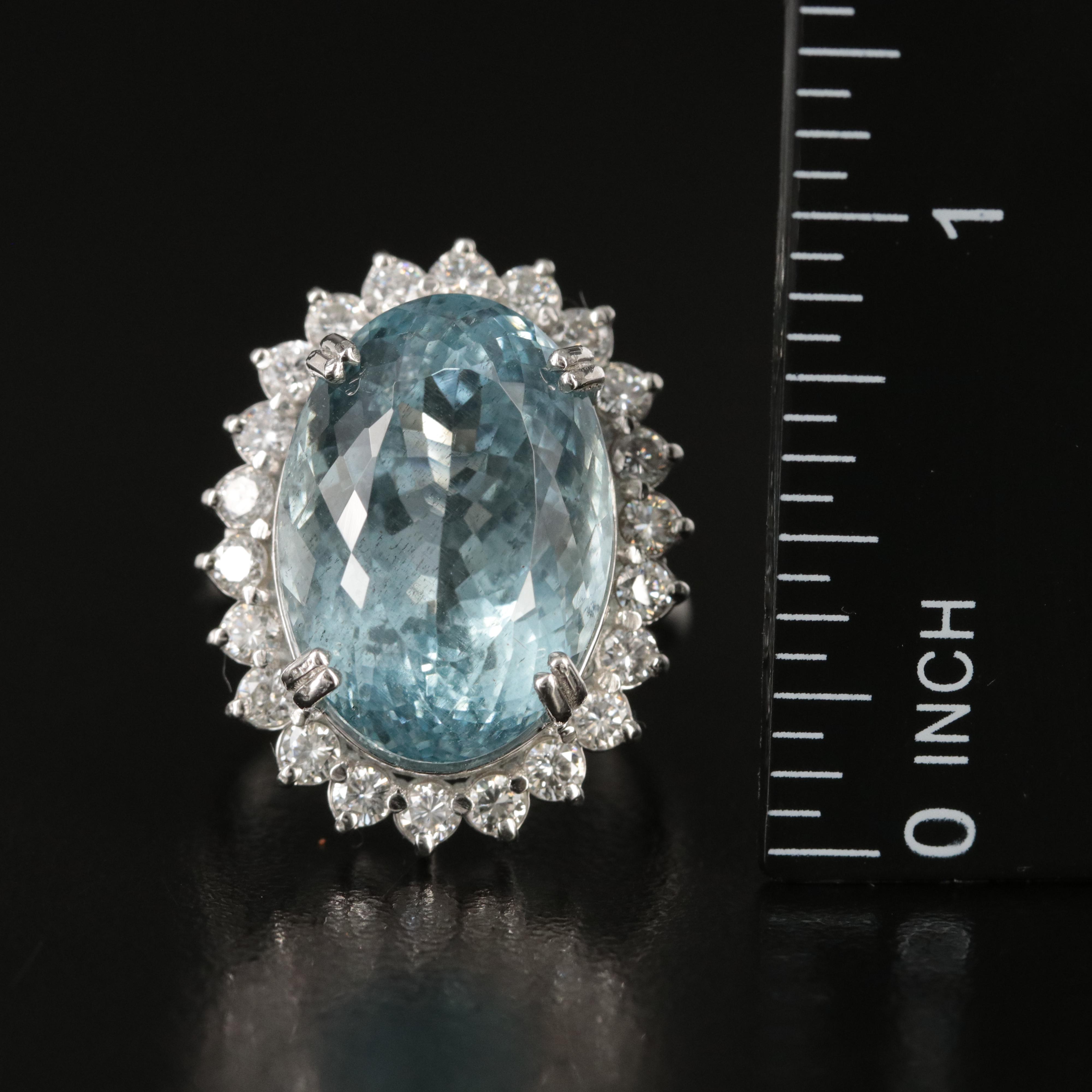 Platinum 16.17 CT Aquamarine and 1.20 CTW Diamond Halo Ring