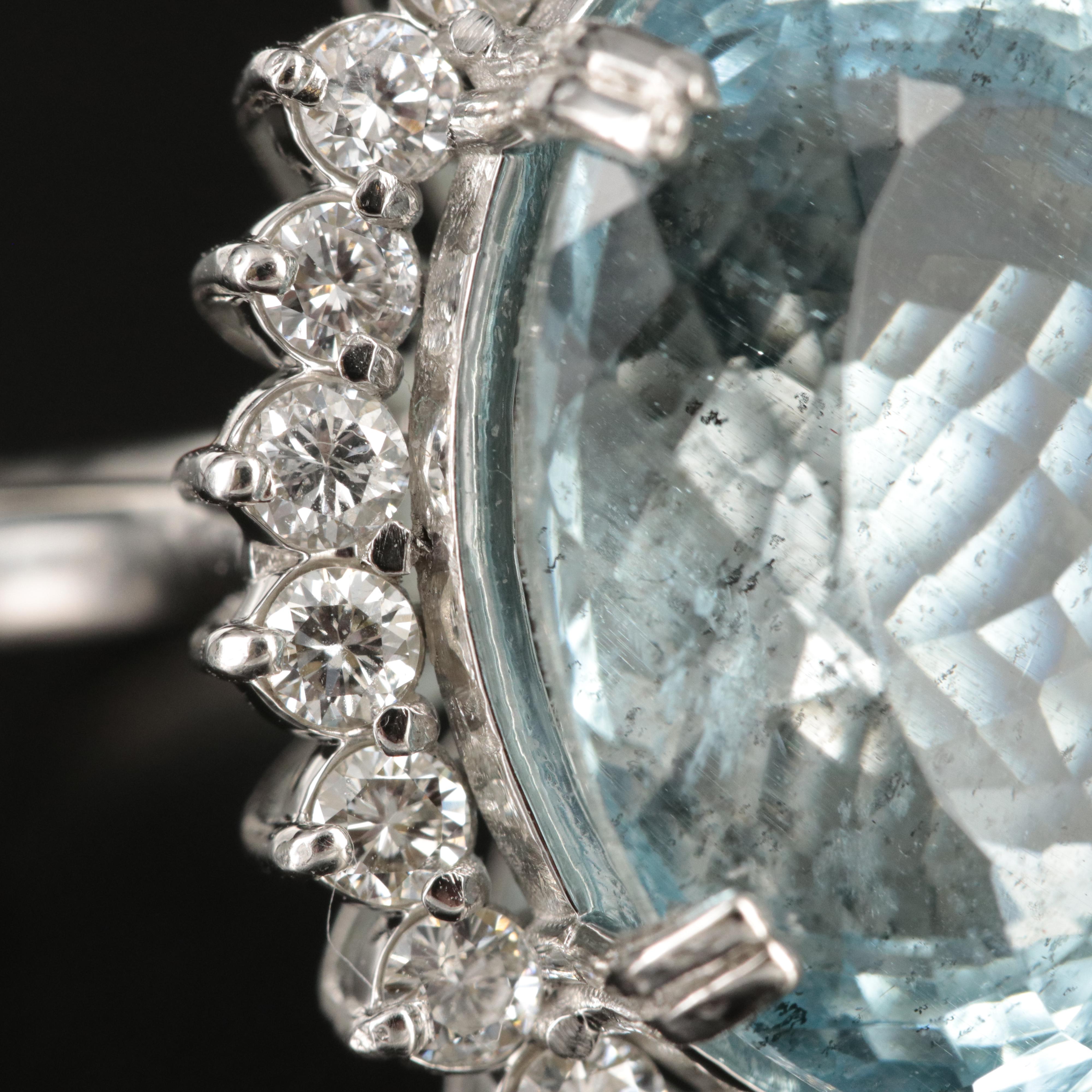 Platinum 16.17 CT Aquamarine and 1.20 CTW Diamond Halo Ring