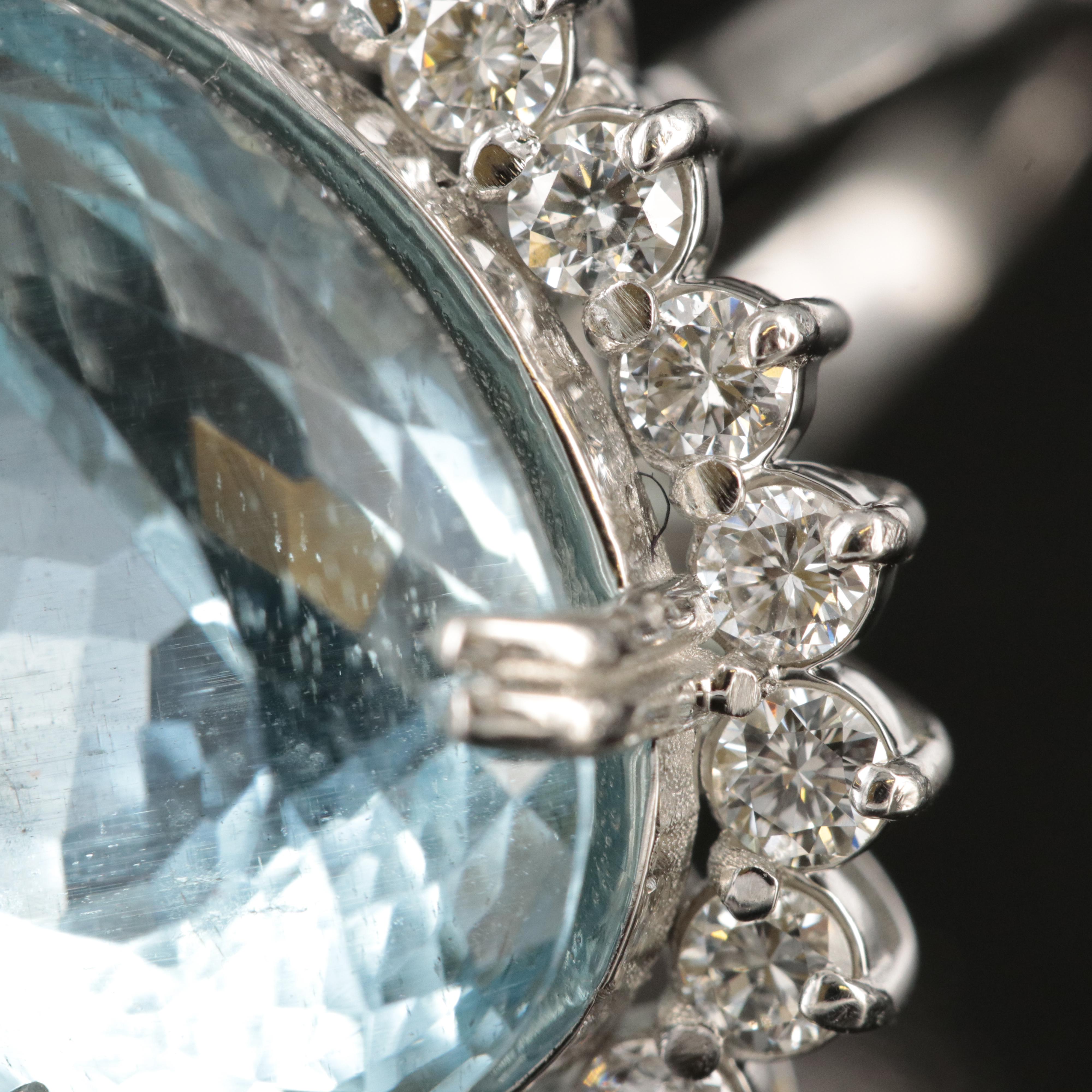 Platinum 16.17 CT Aquamarine and 1.20 CTW Diamond Halo Ring